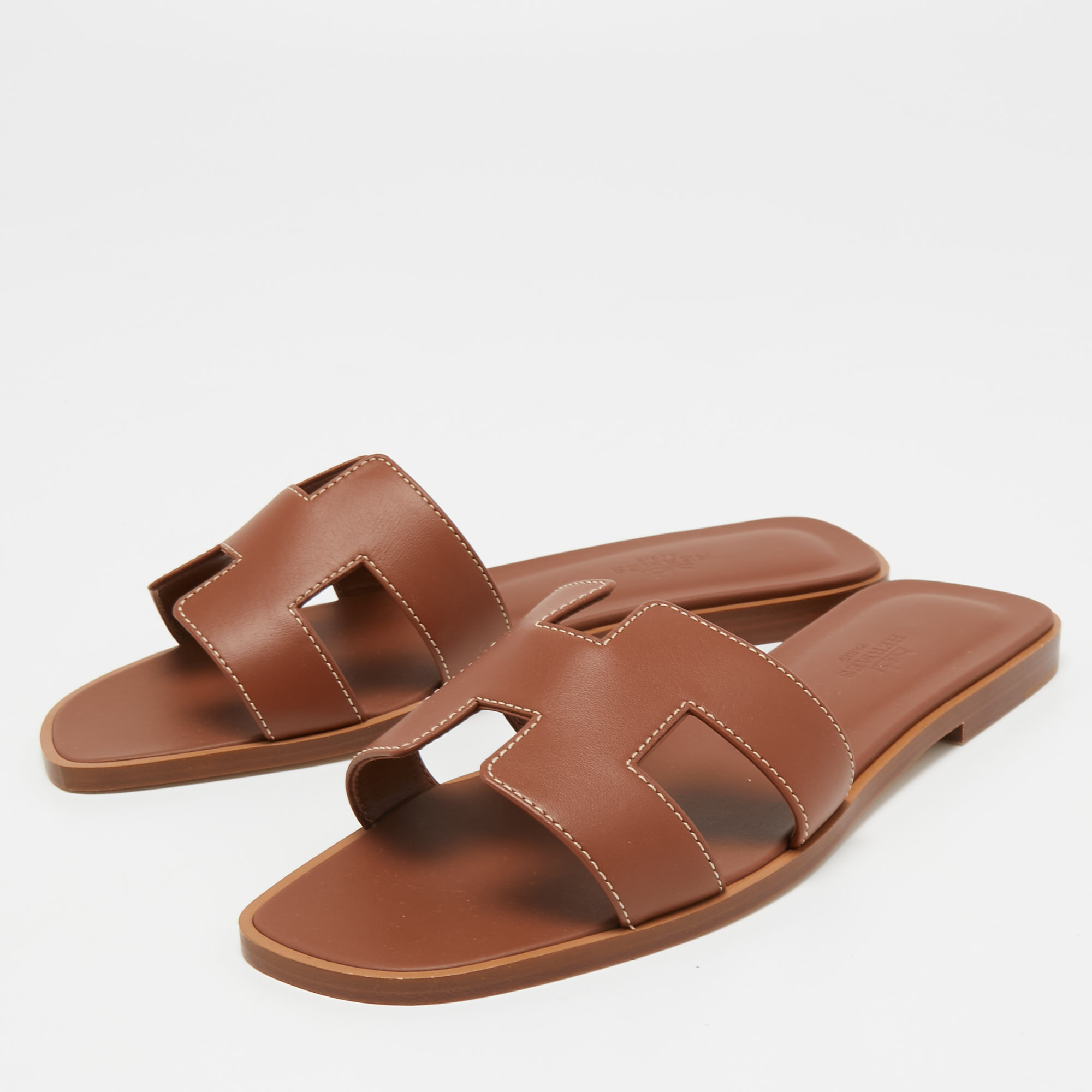 

Hermes Brown Leather Oran Flat Slides Size