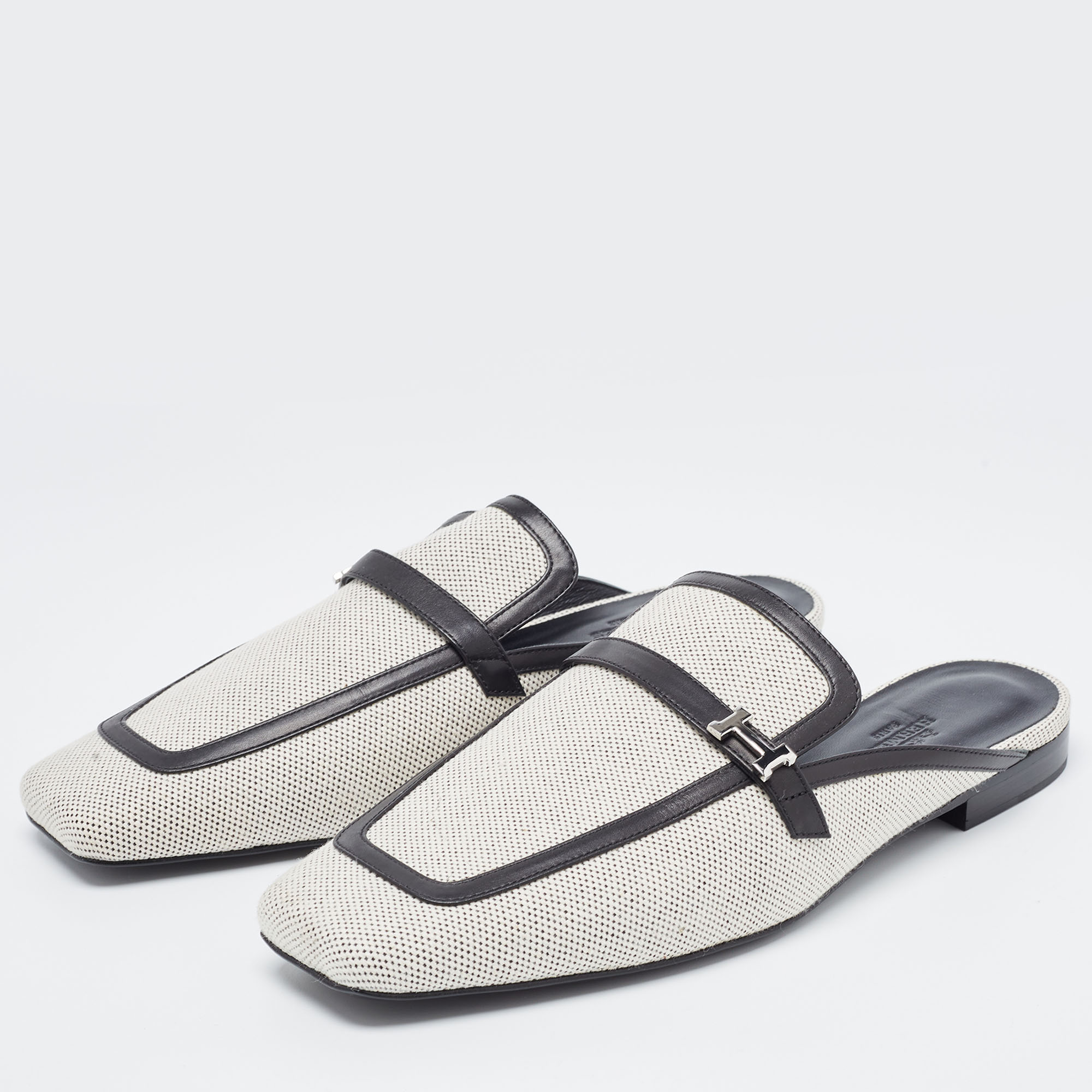 

Hermes White/Black Canvas and Leather Groupie Mules Size