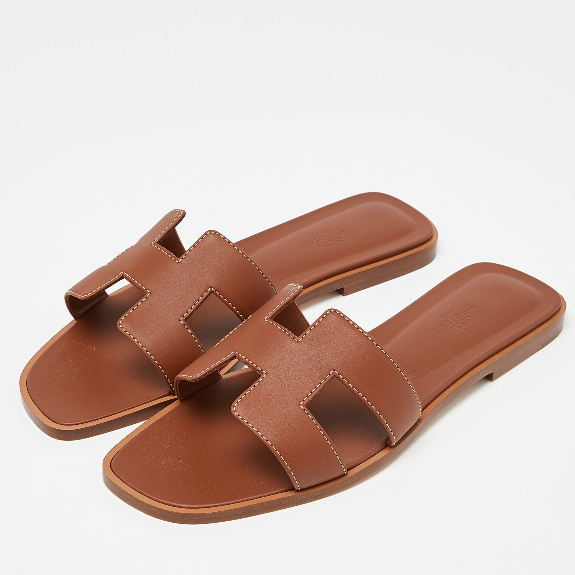 

Hermès Brown Leather Oran Flat Slides Size