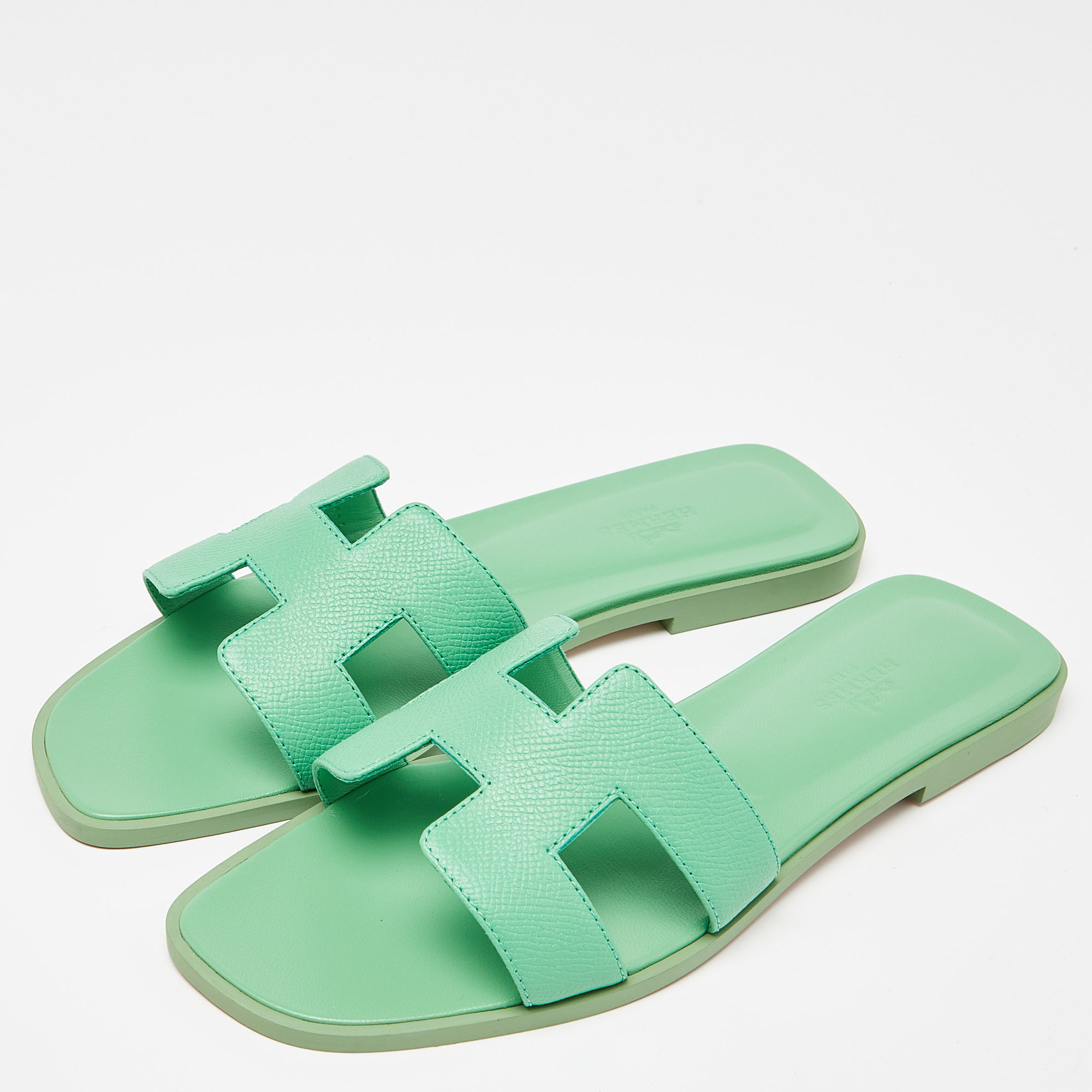 

Hermes Green Leather Oran Flat Slides Size