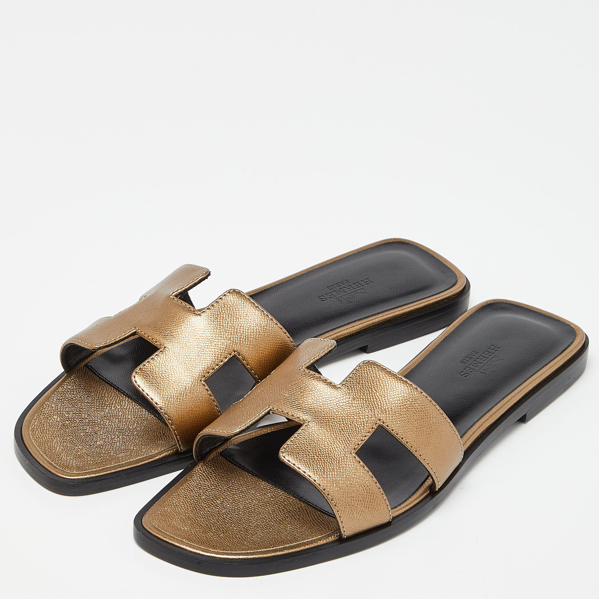 

Hermès Gold Leather Oran Flat Slides Size