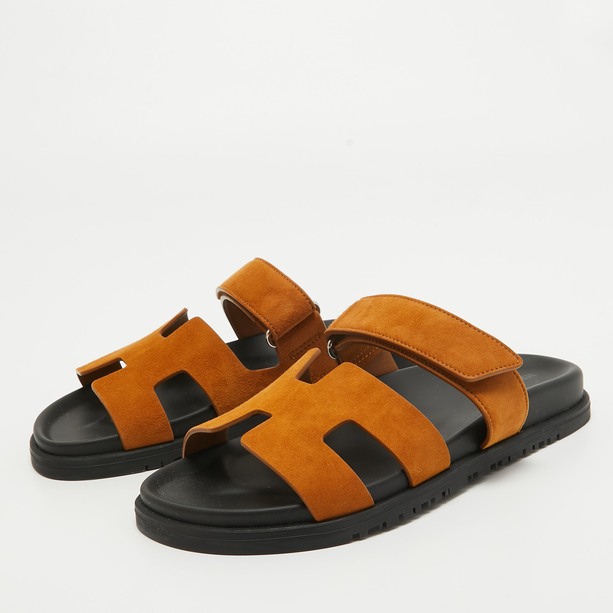 

Hermès Brown Suede Chypre Sandals Size