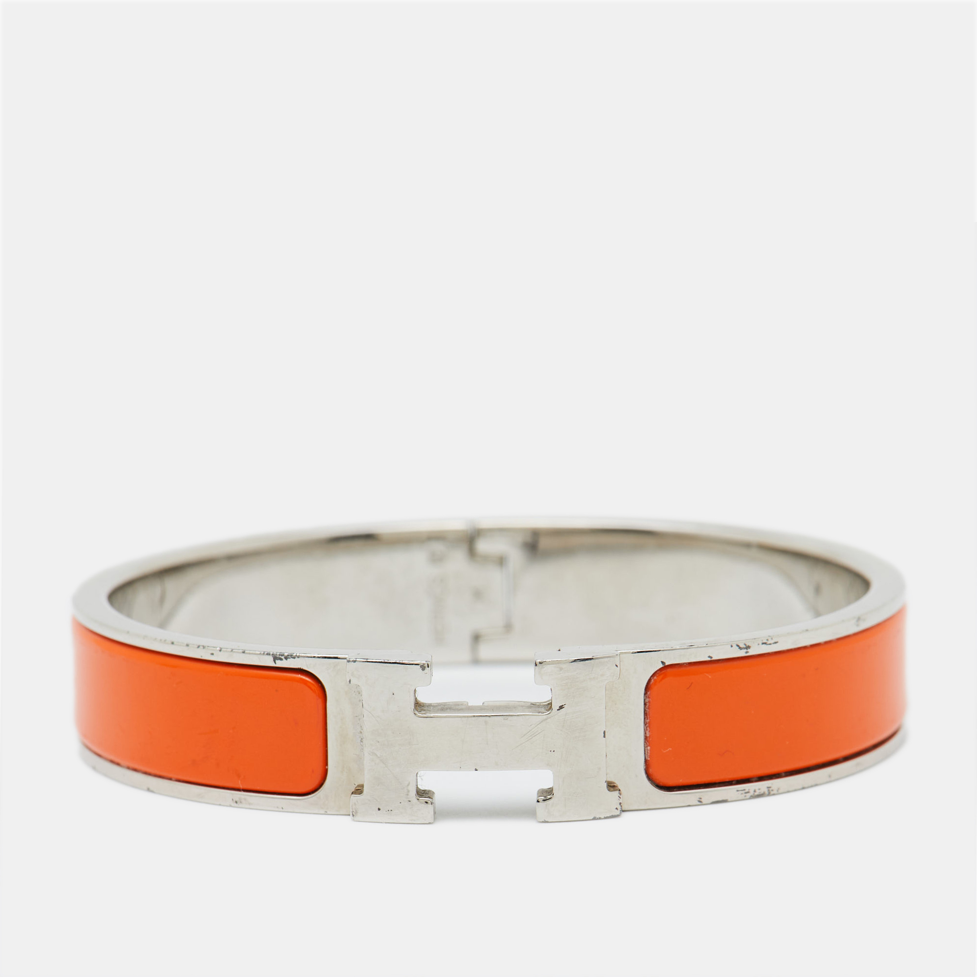 

Hermes Clic H Orange Enamel Palladium Plated Bracelet