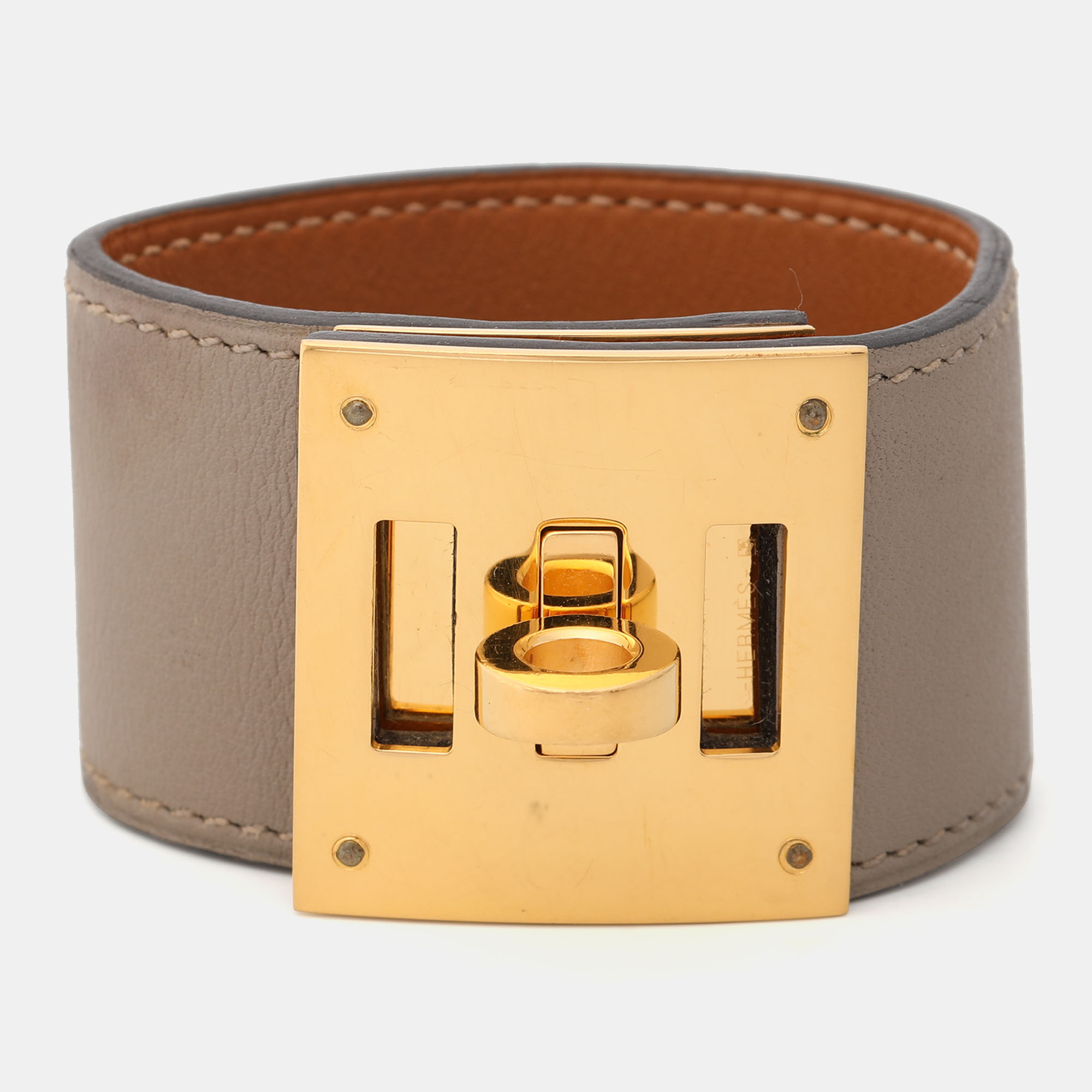 

Hermes Grey Leather Gold Plated Kelly Dog Cuff Bracelet