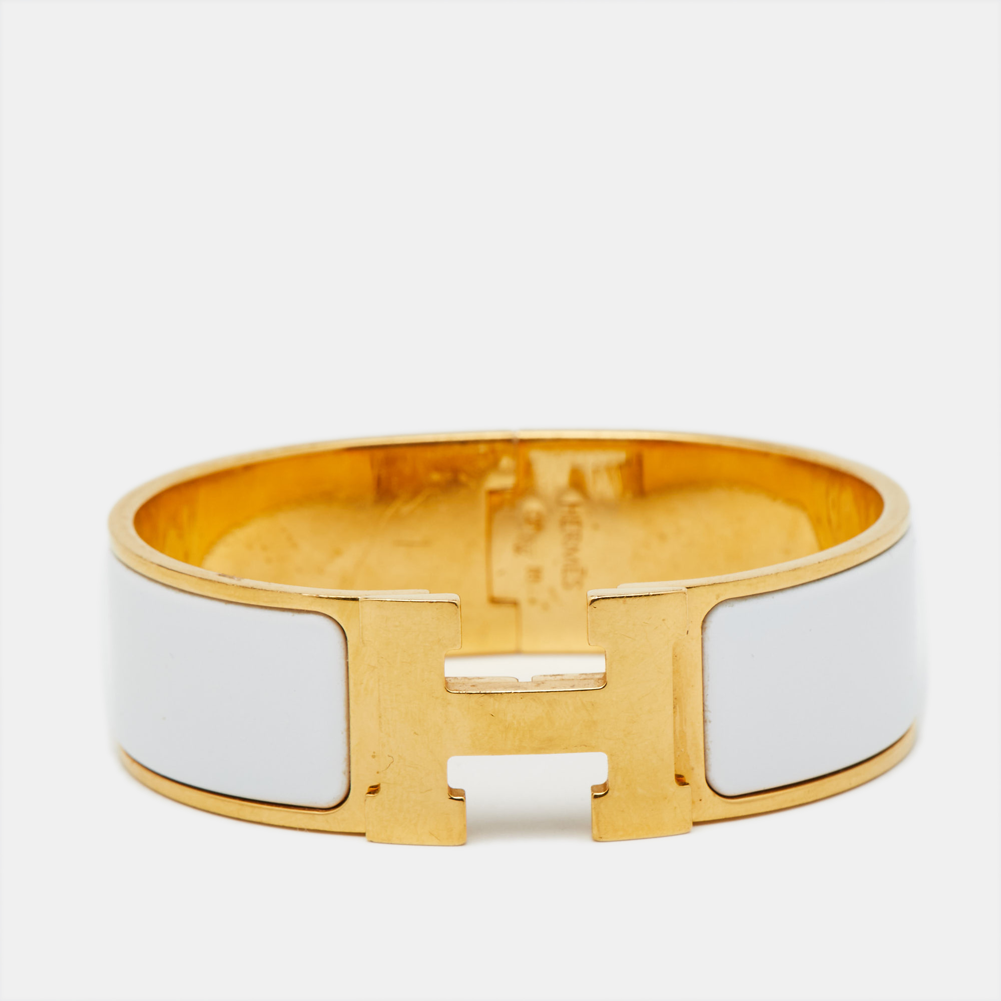 

Hermès Clic Clac H White Enamel Gold Plated Wide Bracelet