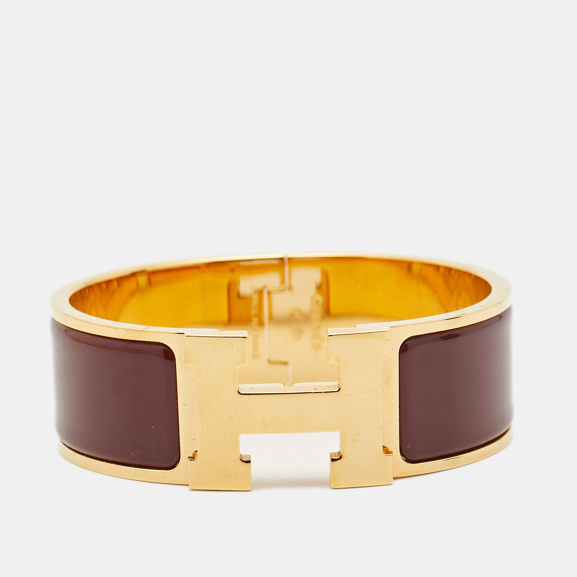 

Hermès Clic Clac H Burgandy Enamel Gold Plated Bracelet, Burgundy