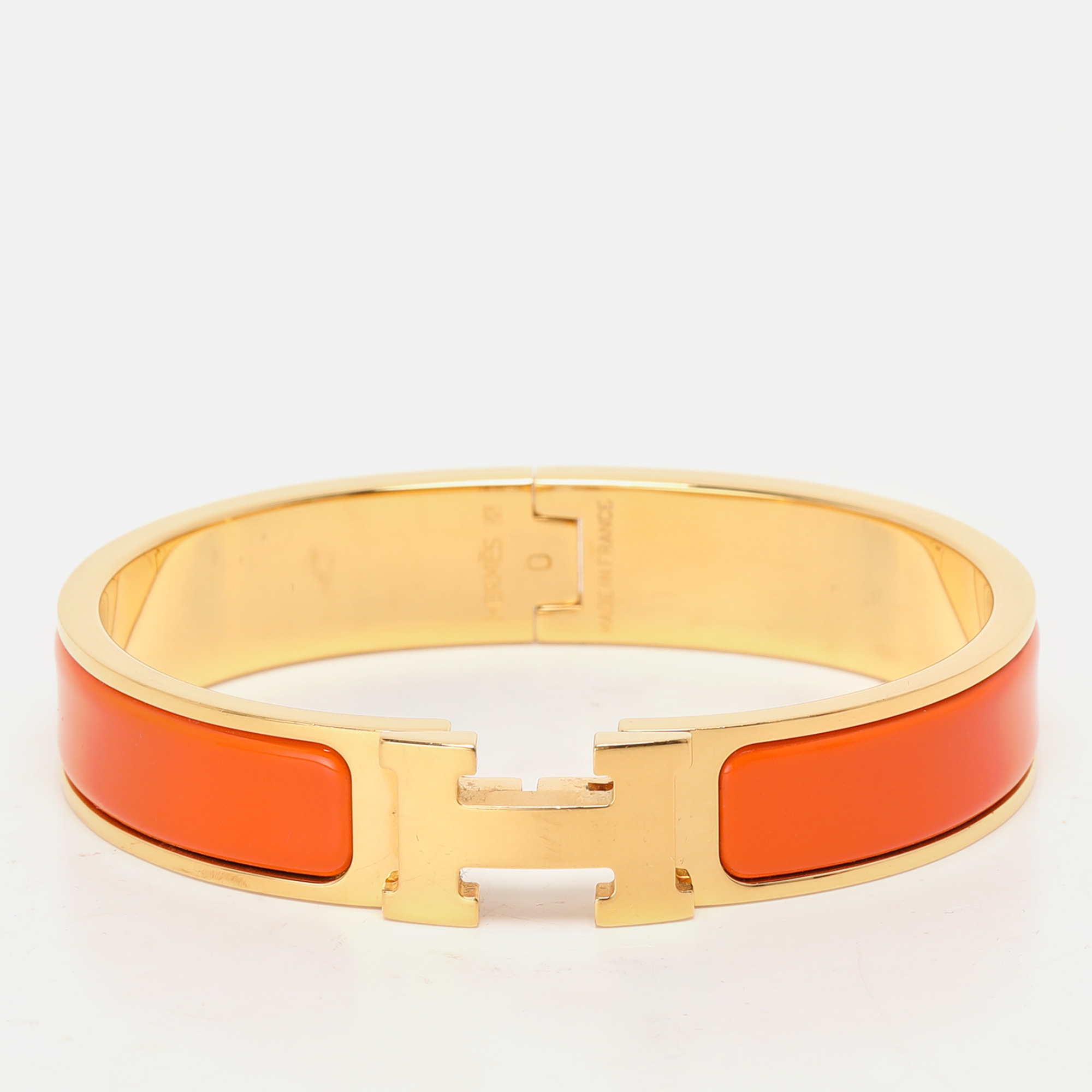 

Hermes Clic H Orange Enamel Gold Plated Narrow Bracelet