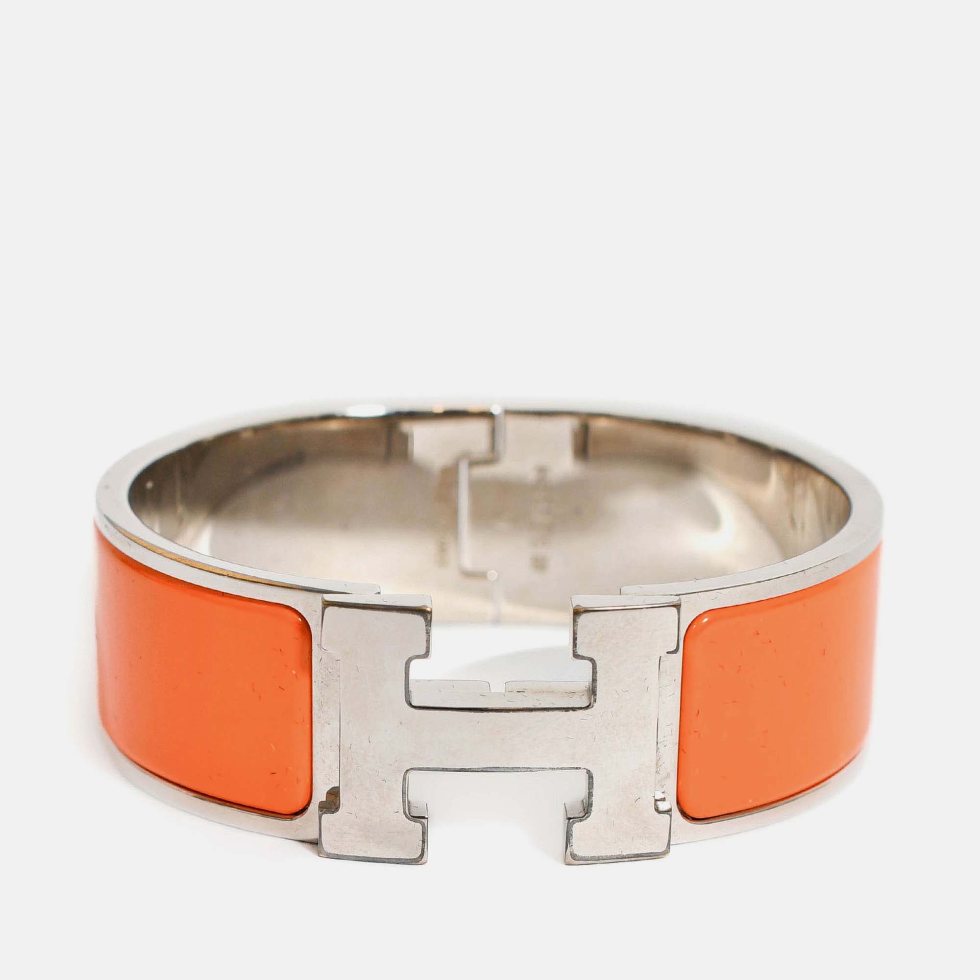 

Hermes Silver Toned/Orange Ceramic Clic Clac Bracelet