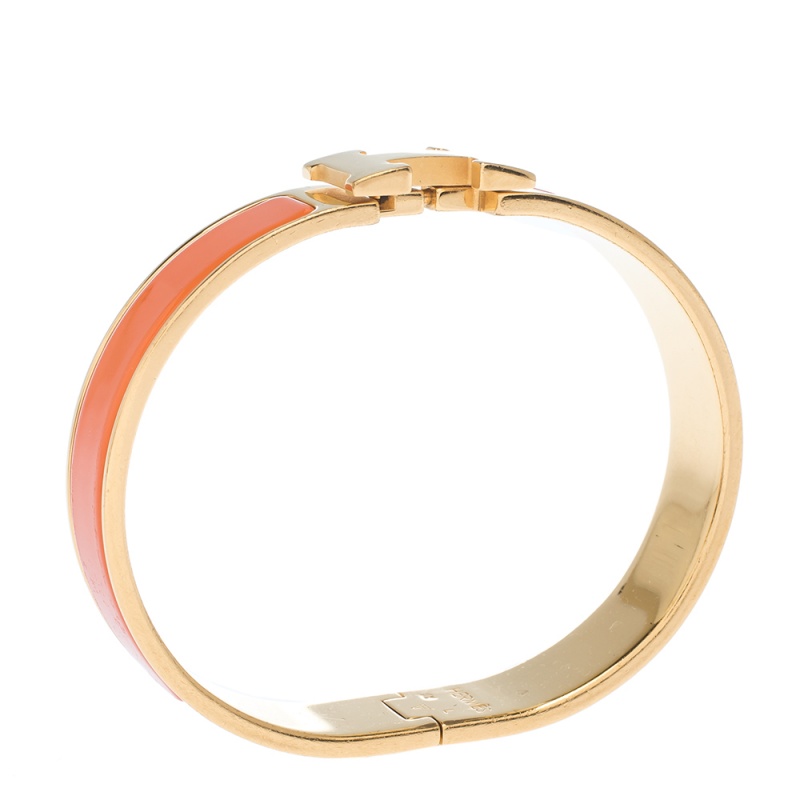 

Hermes Clic H Orange Enamel Gold Plated Narrow Bracelet GM