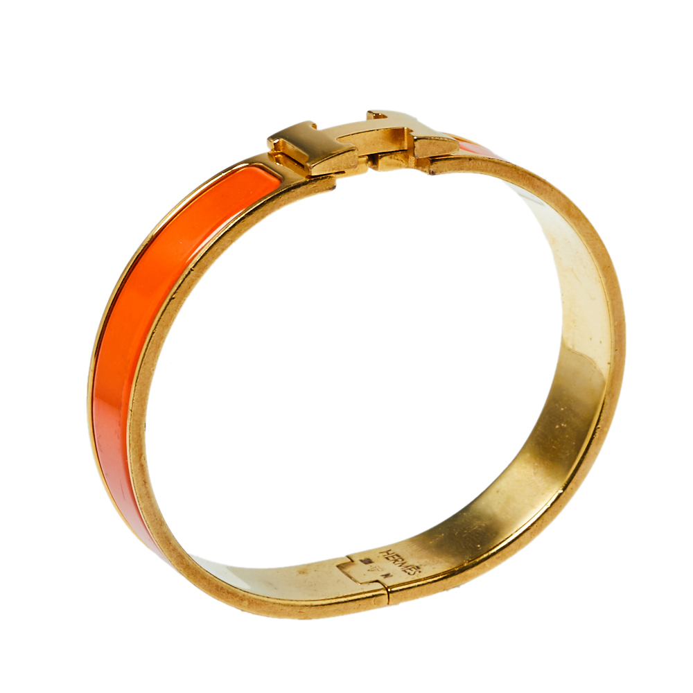 

Herm÷s Clic H Orange Enamel Gold Plated Narrow Bracelet PM