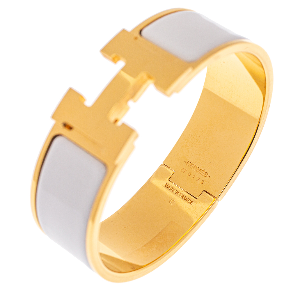 

Herm÷s Clic Clac H White Enamel Gold Plated Wide Bracelet PM