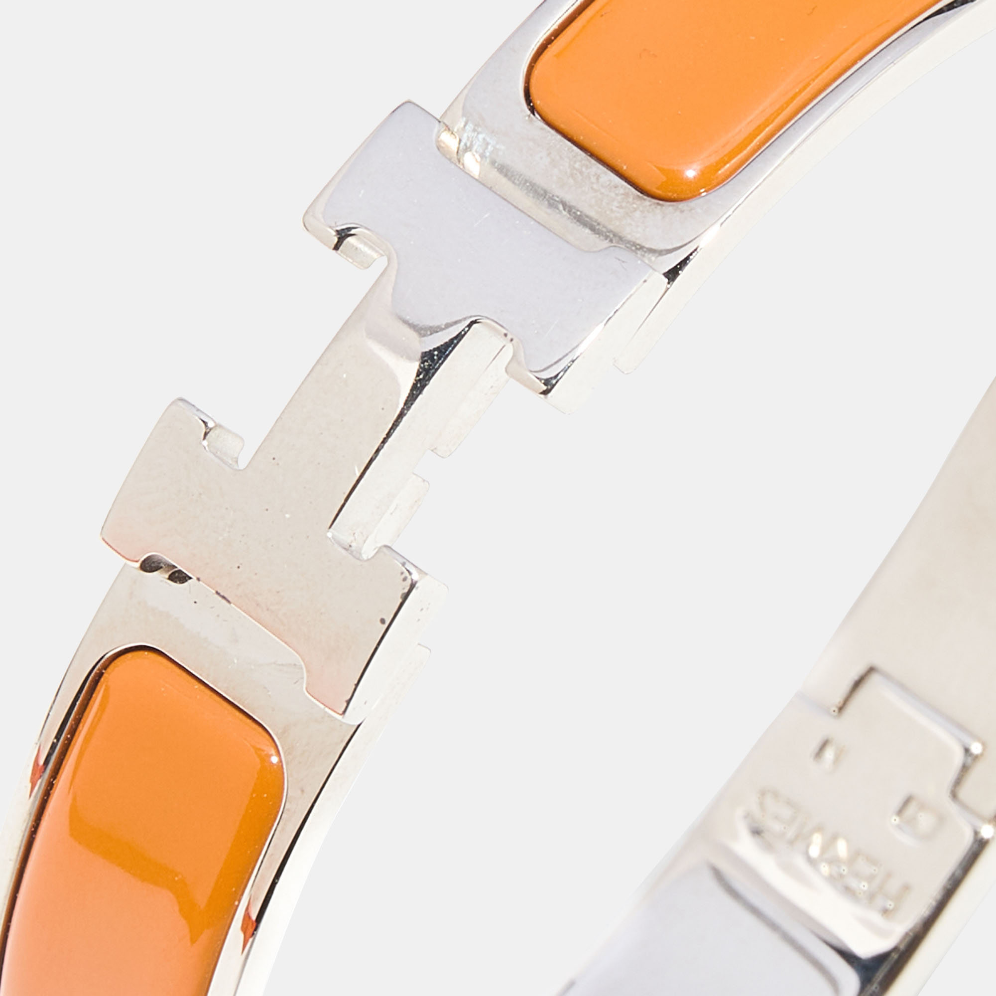 

Hermès Clic H Orange Enamel Palladium Plated Narrow Bracelet