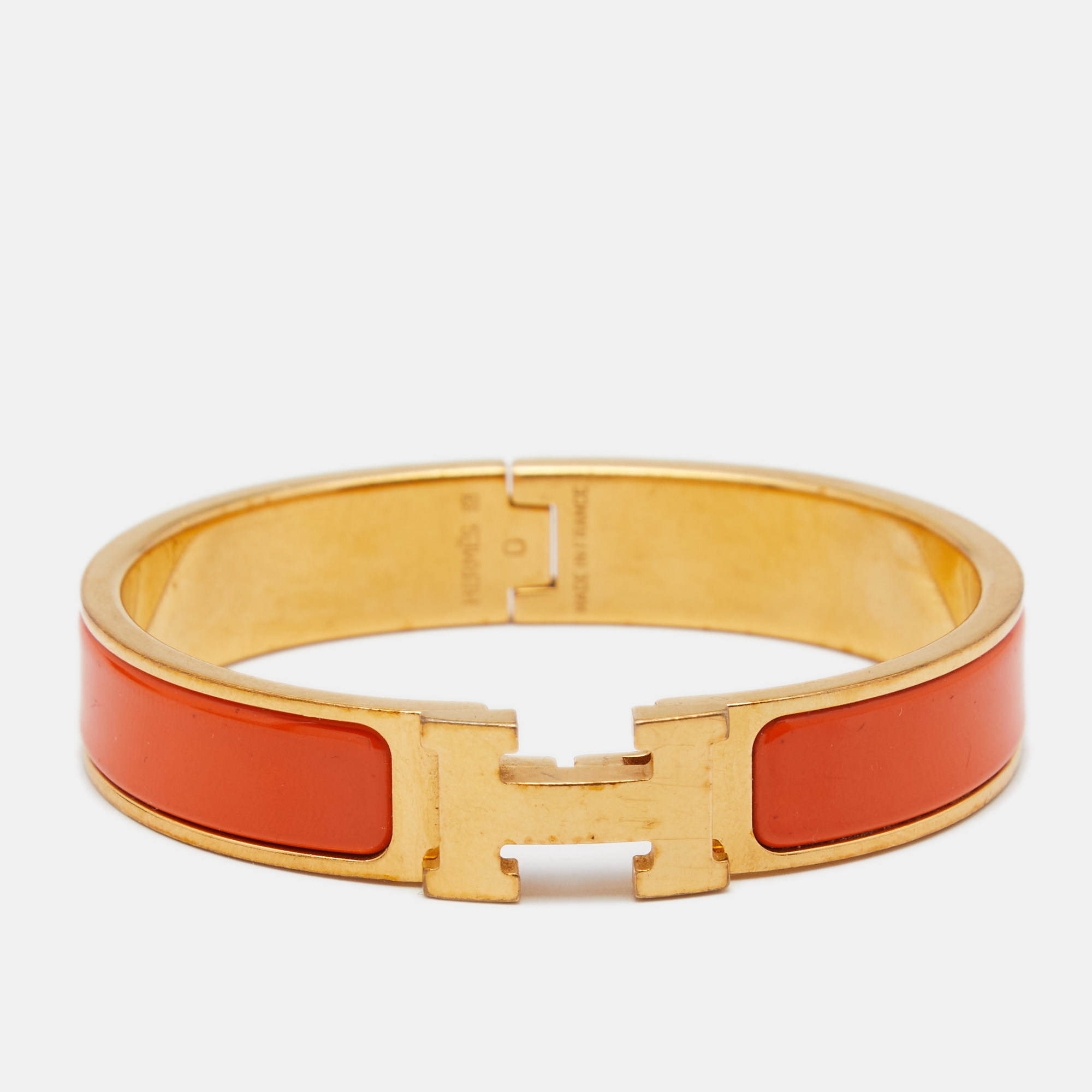 Preowned Hermes Clic H Gold Plate Orange Enamel Cuff Bracelet Pm