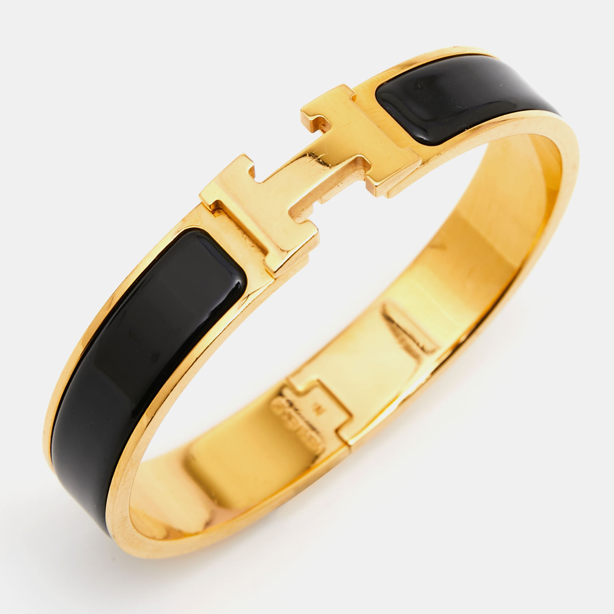 

Hermes Clic H Black Enamel Gold Tone Metal Bracelet PM