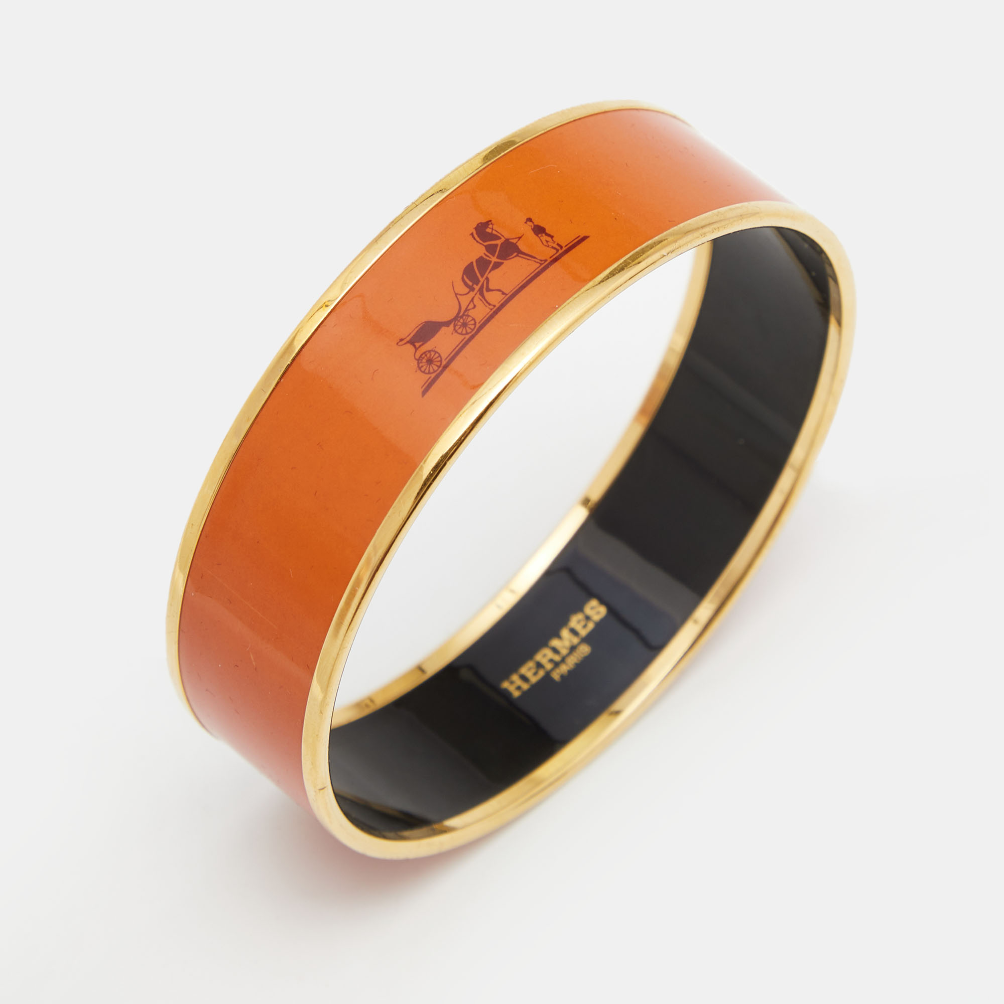 

Hermes Wide Orange Enamel Gold Tone Metal Bangle Bracelet