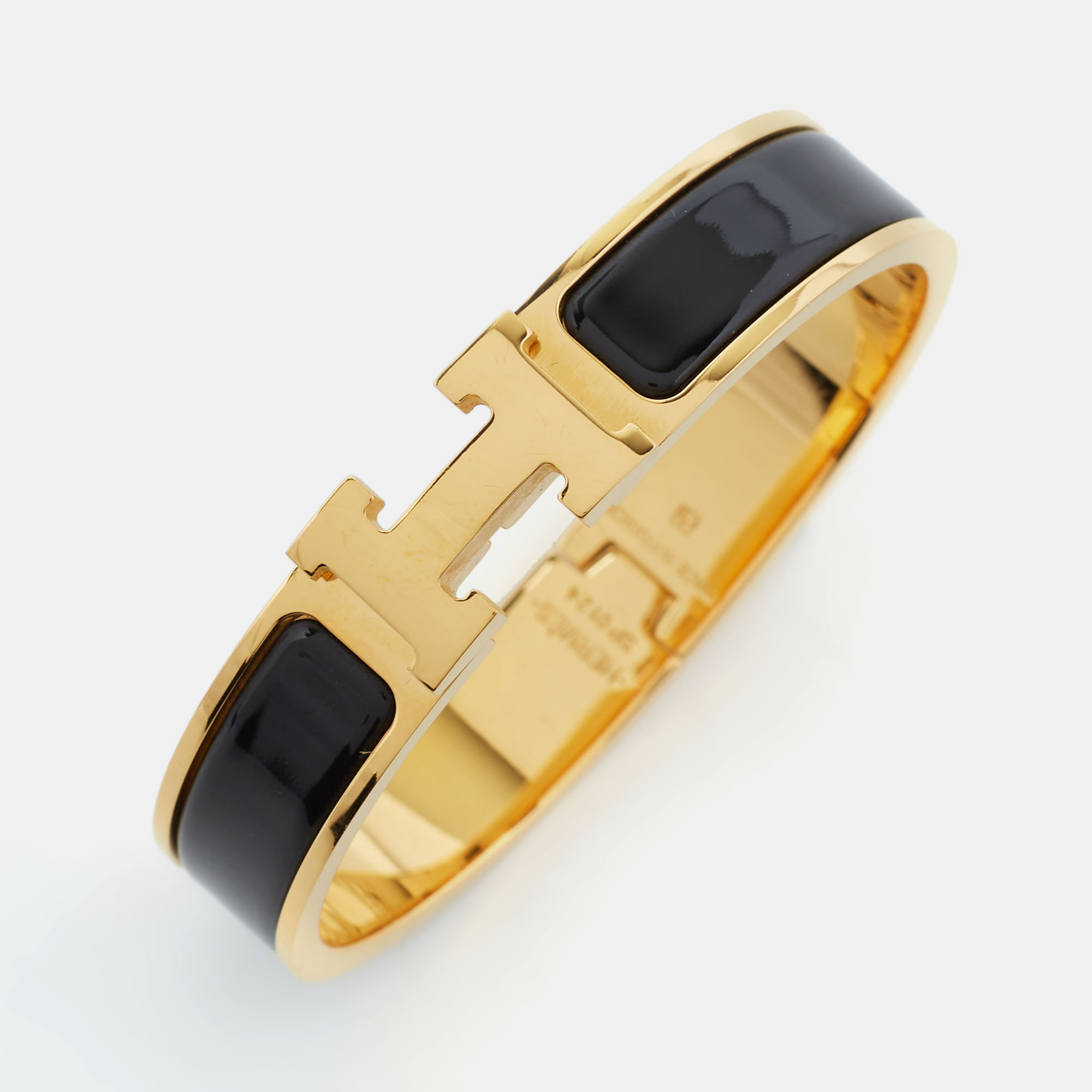 

Hermès Clic H Black Enamel Gold Plated Narrow Bracelet