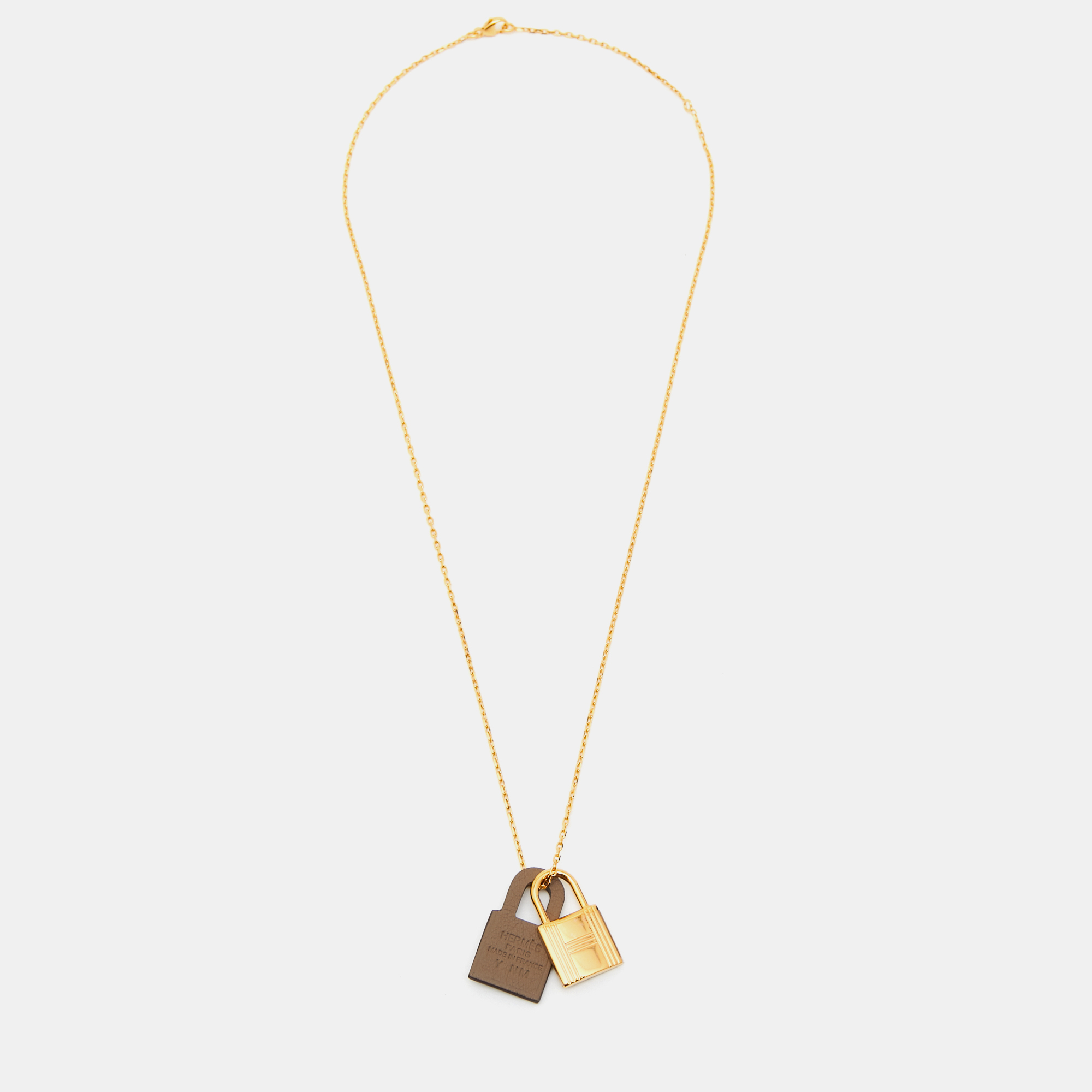 

Hermès Gold Plated & Leather O'Kelly Pendant Necklace