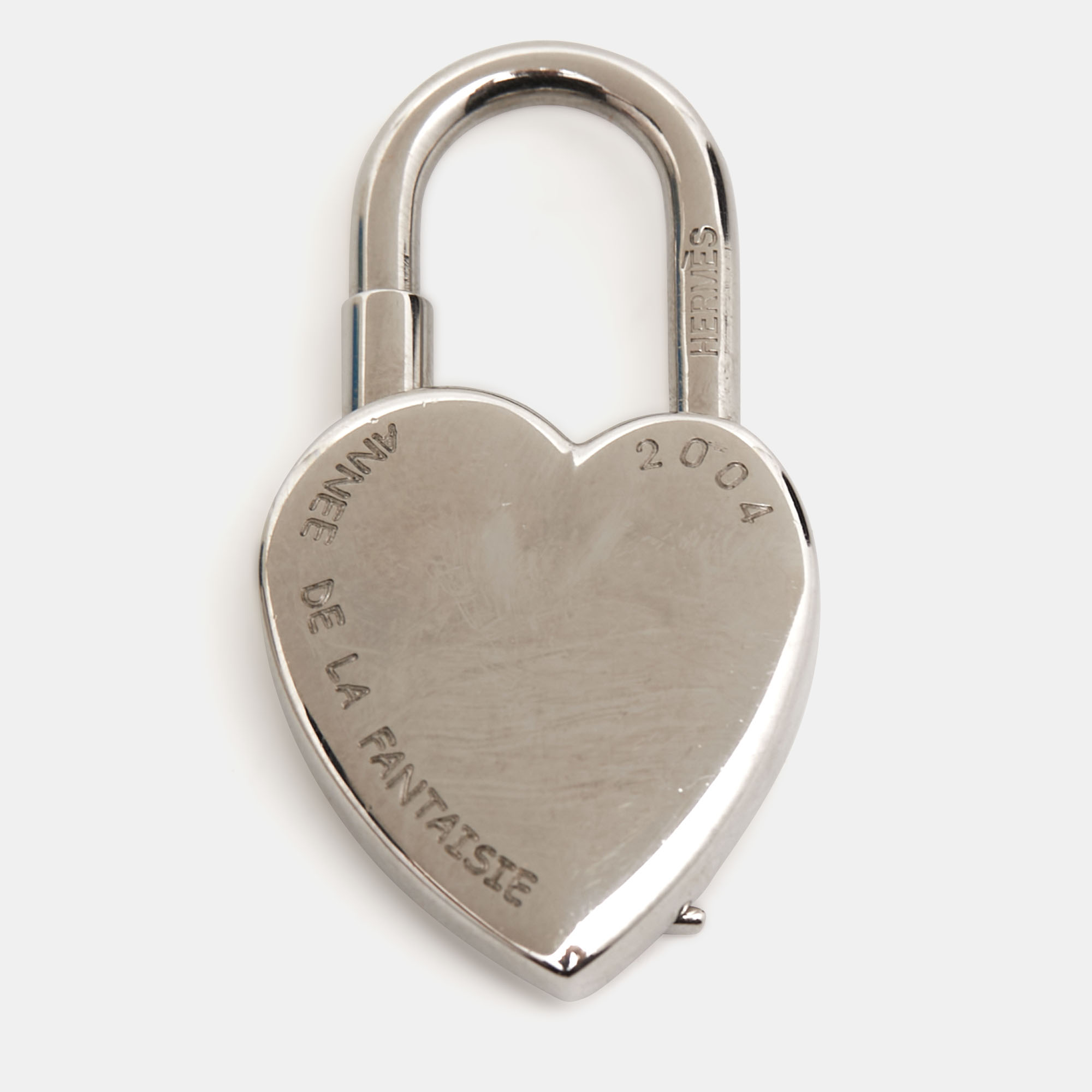 

Hermes Cadena Heart Silver Tone Lock Bag Charm