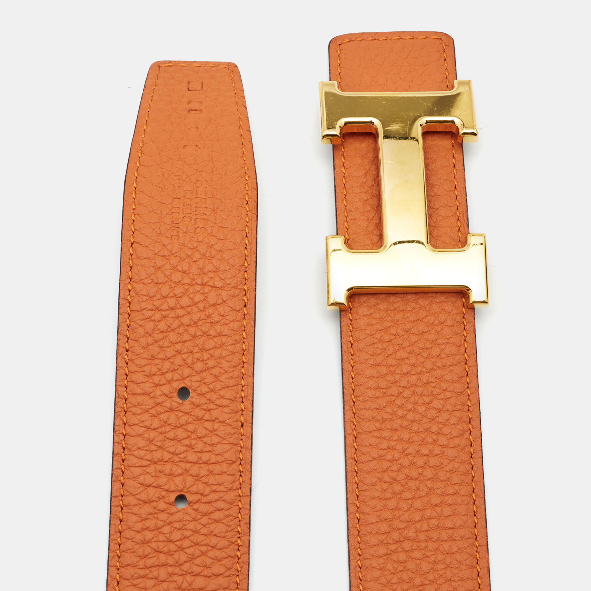 

Hermes Orange/Black Togo and Box Leather Gold Finish Reversible H Buckle Belt