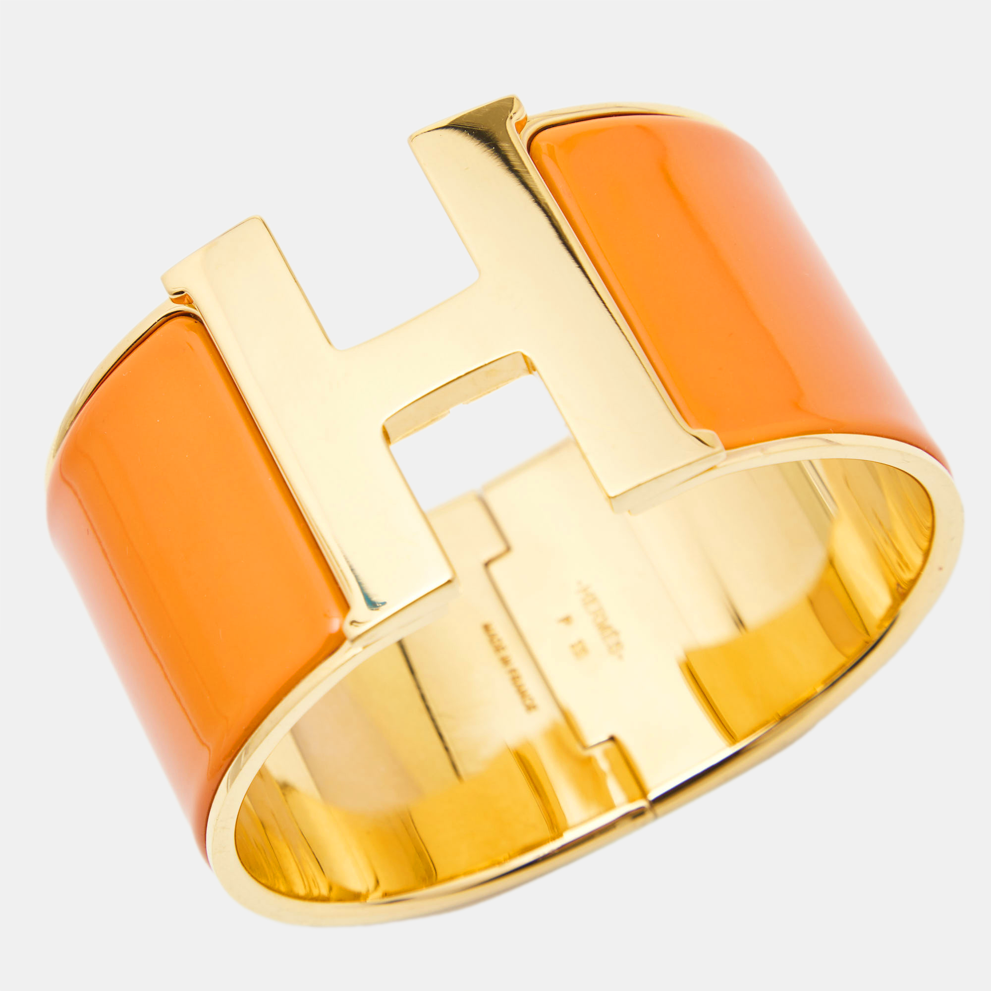 

Hermes Clic Clac H Orange Enamel Gold Plated Extra Wide Bracelet