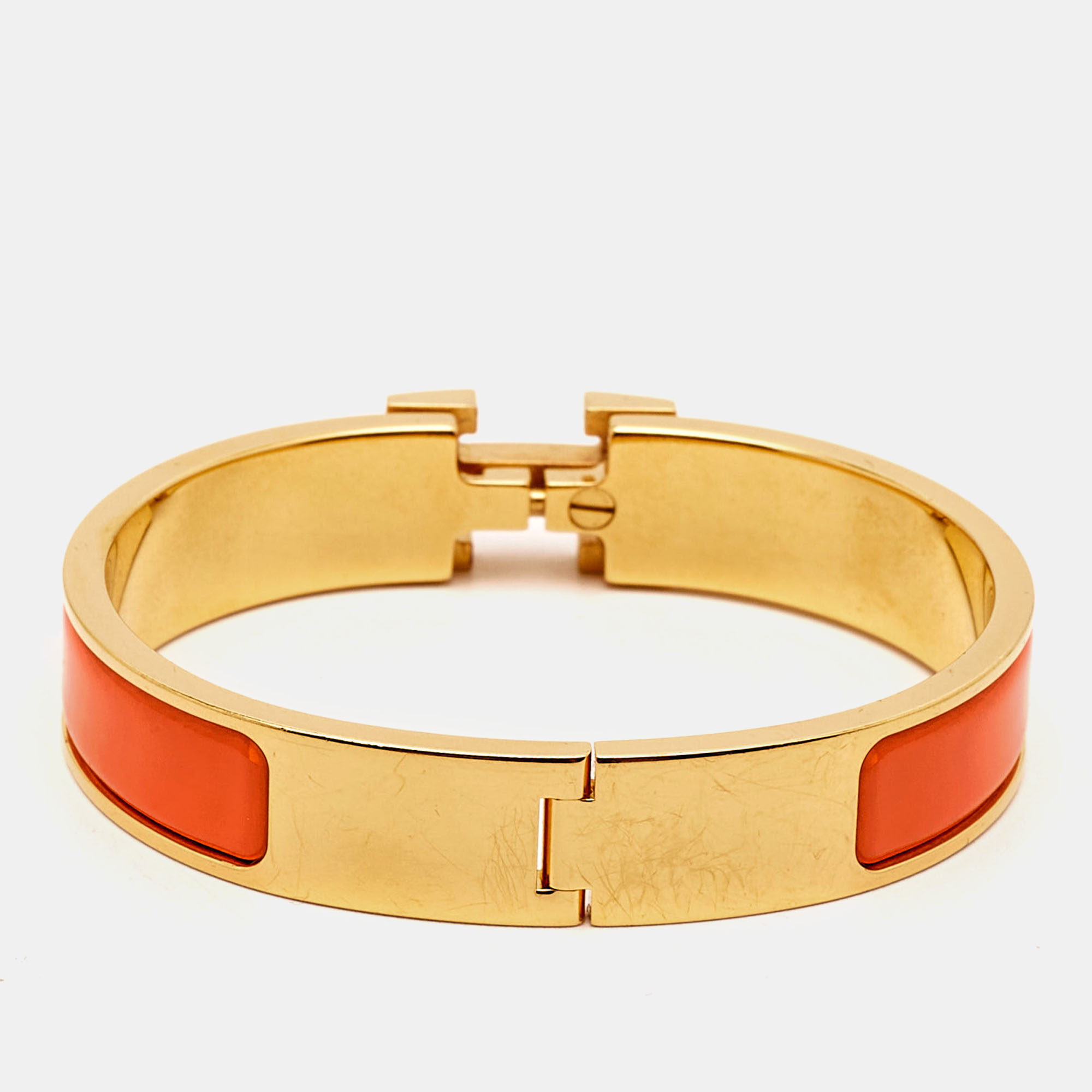 

Hermes Clic H Orange Enamel Gold Plated Bracelet