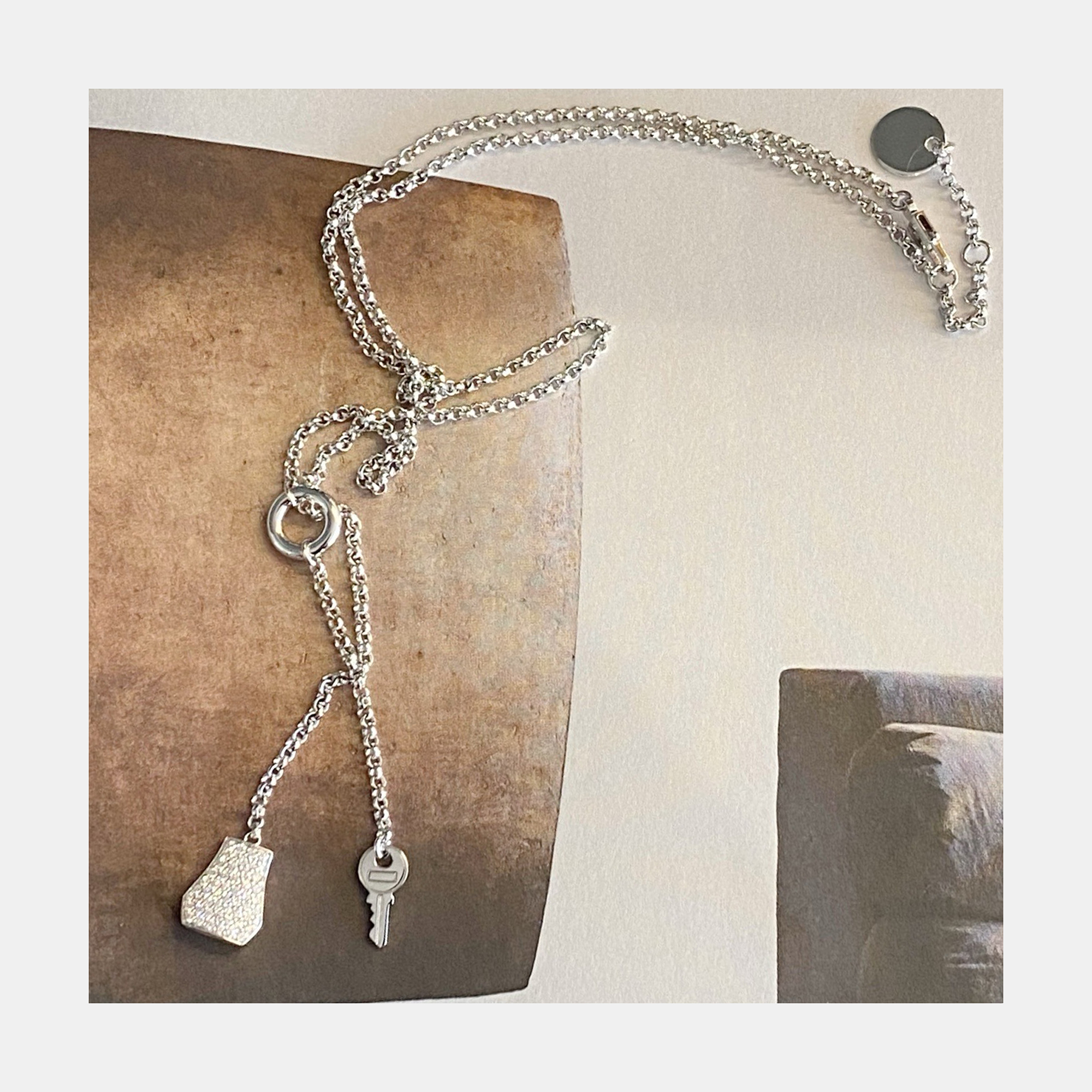 

Hermes Kelly Clochette Long Necklace 18K White Gold Diamond Set