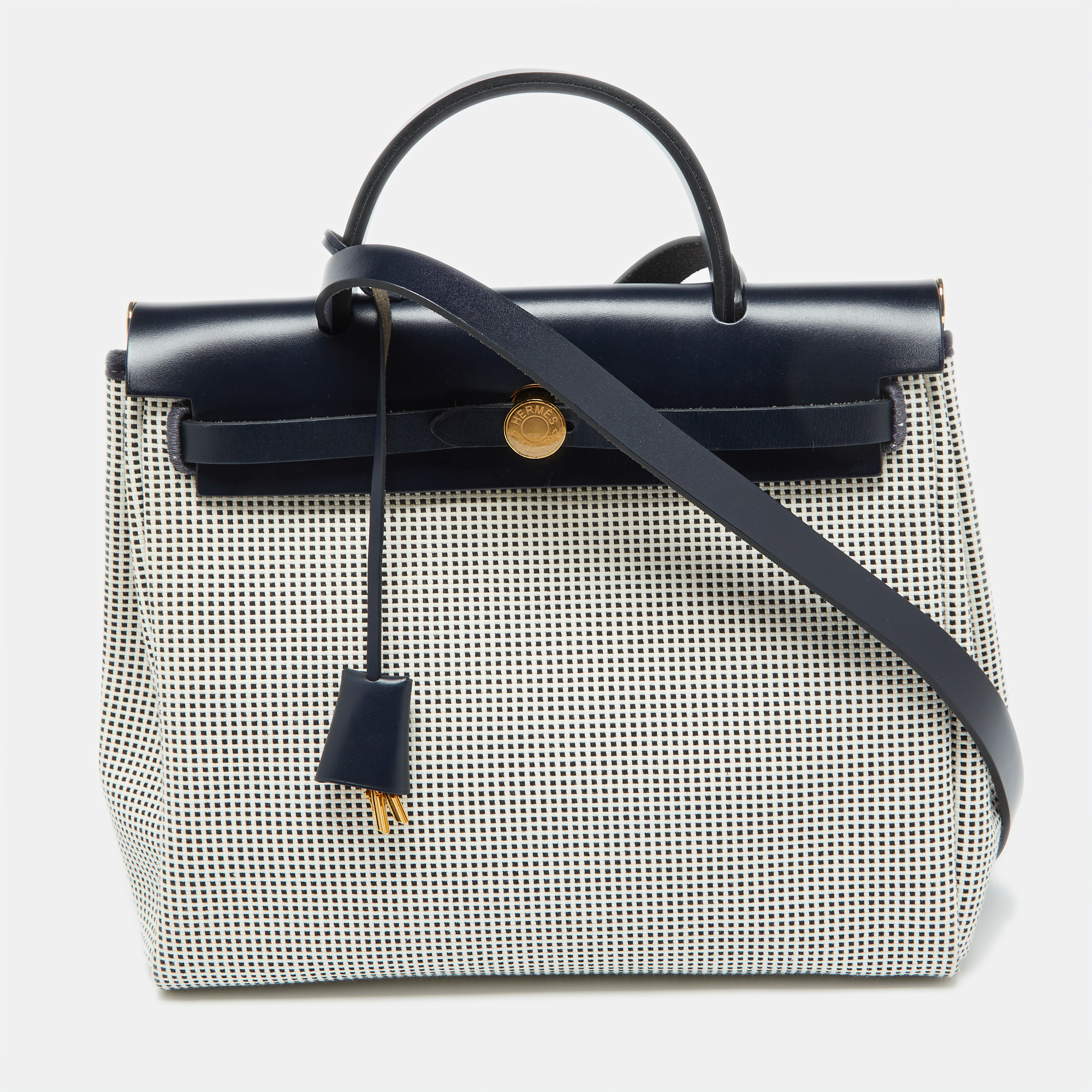 

Hermès Ecru Blanc Noir/Bleu Indigo Vache Hunter/Toile Quadrille Viking Leather Herbag Zip Retourne 31 Bag, Multicolor