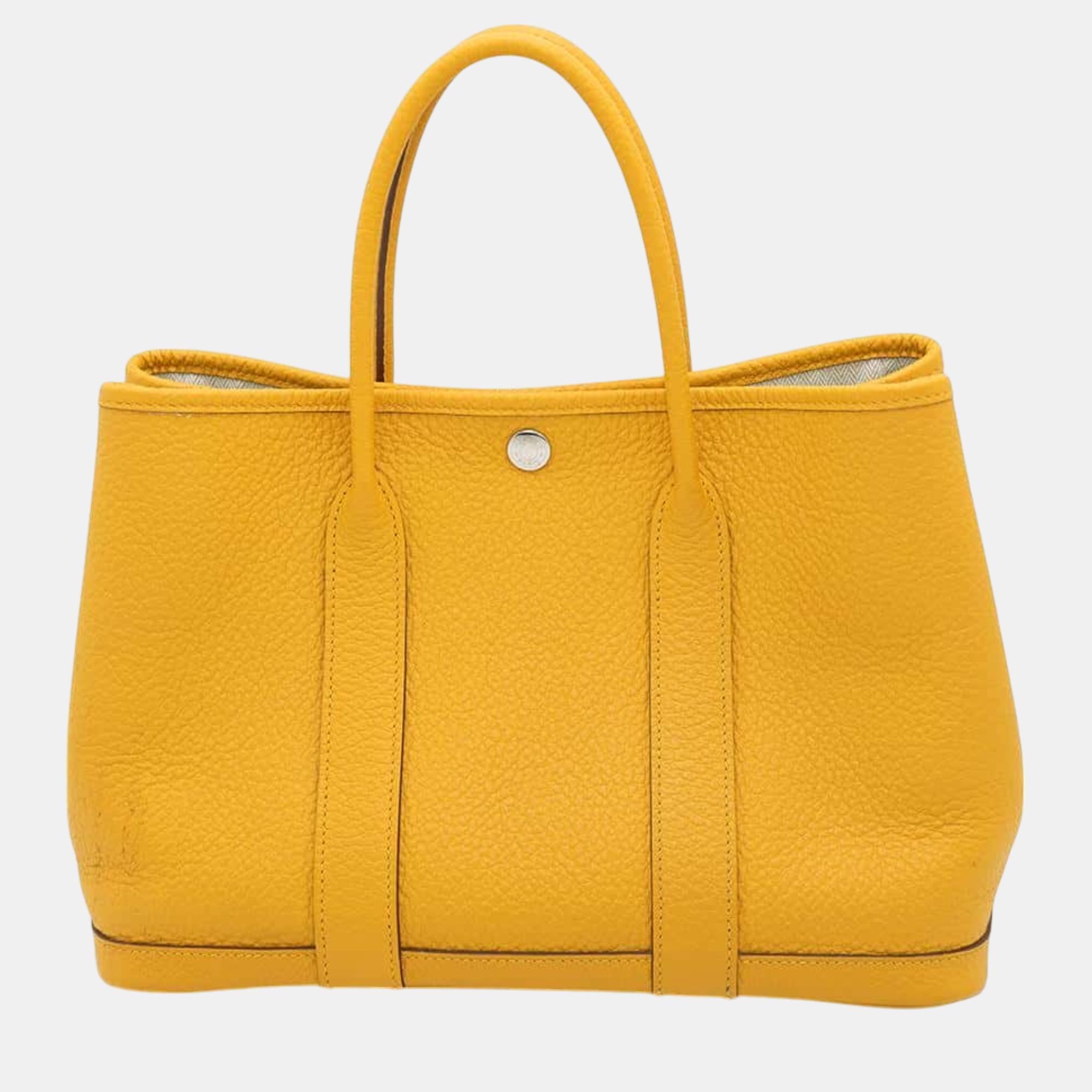 

Hermes Jaune Ambre Negonda Leather Garden Party TPM Bag, Yellow