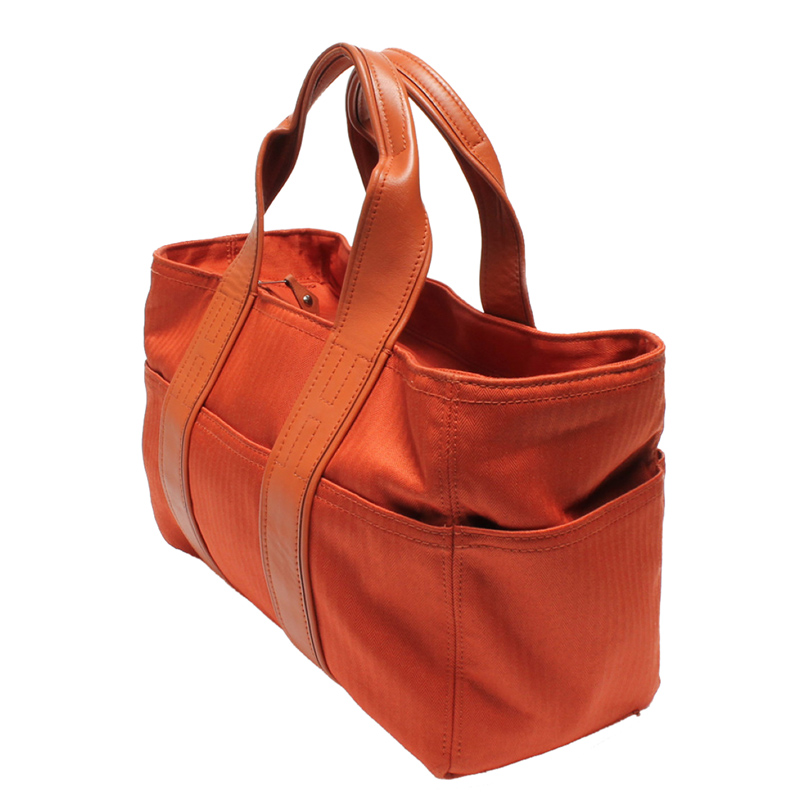 

Hermes Orange Toile Canvas Acapulco PM Bag