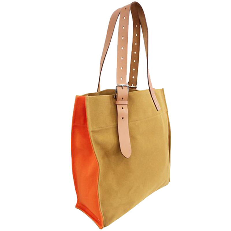 

Hermès Orange/Beige Canvas And Leather Shopping Bag