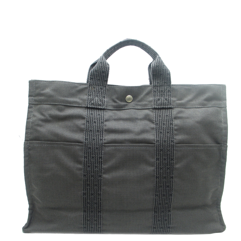 Click to view more detailed imagery on our partner's website Hermes Grey Canvas Her Line Tote Bag