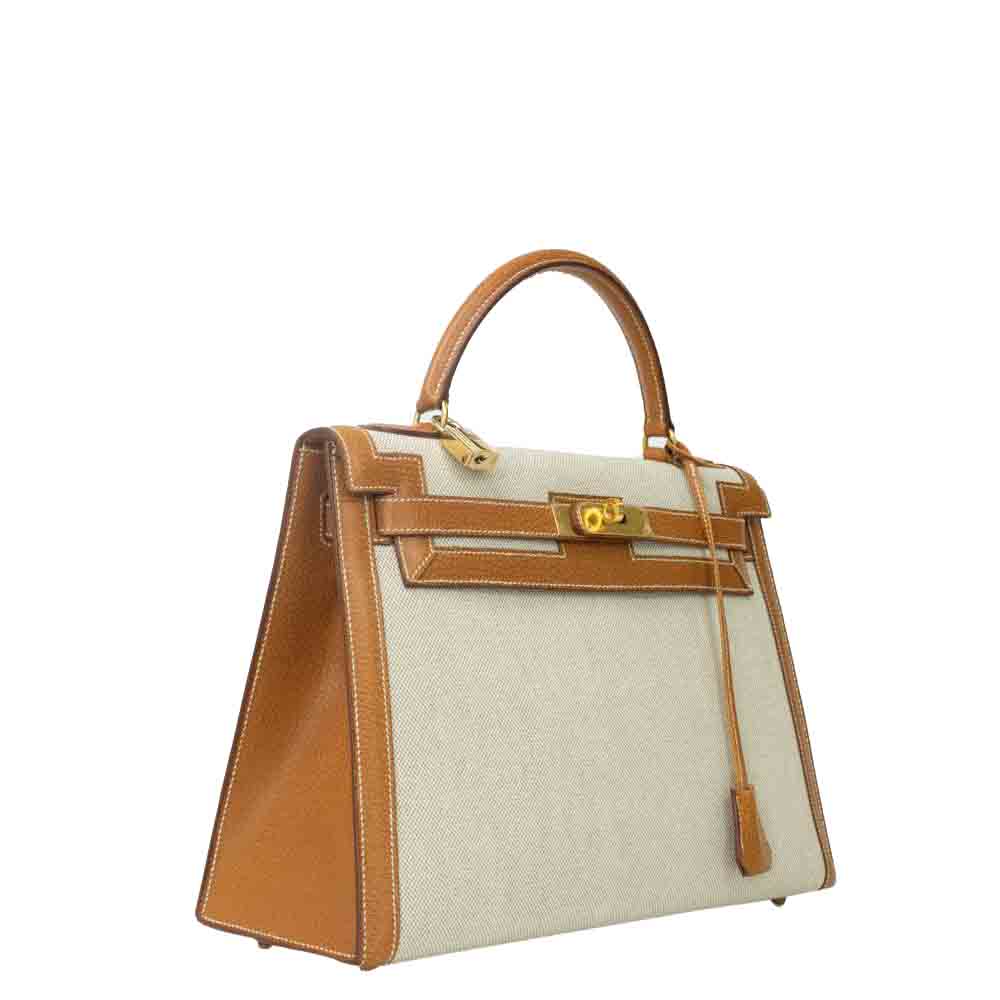 

Hermes Beige Canvas Leather Gold Hardware Kelly Bag