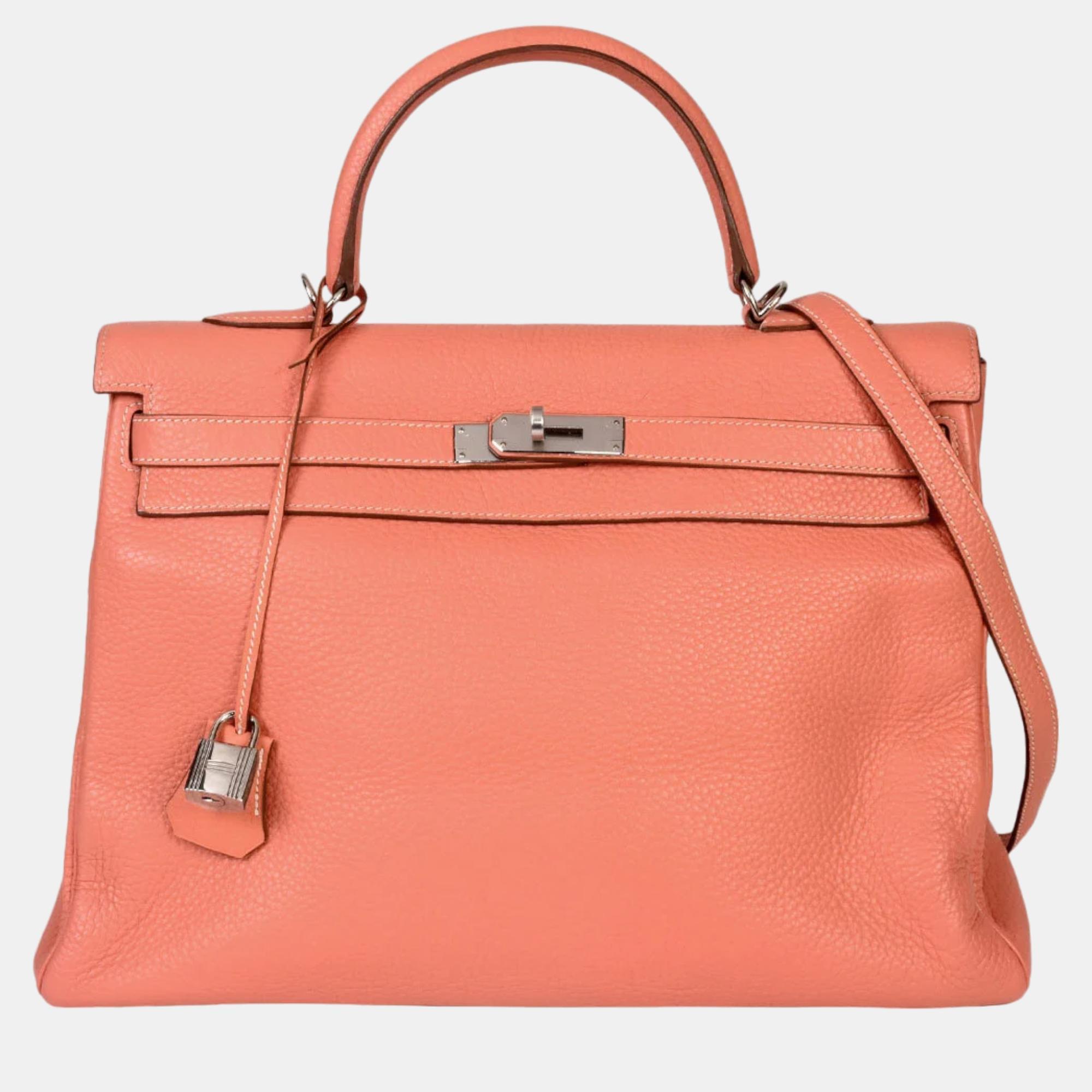 

HERMES Kelly 35 Inner stitching Q stamp (manufactured in 2013) Flamingo Taurillon Clemence Handbag with shoulder strap, Pink