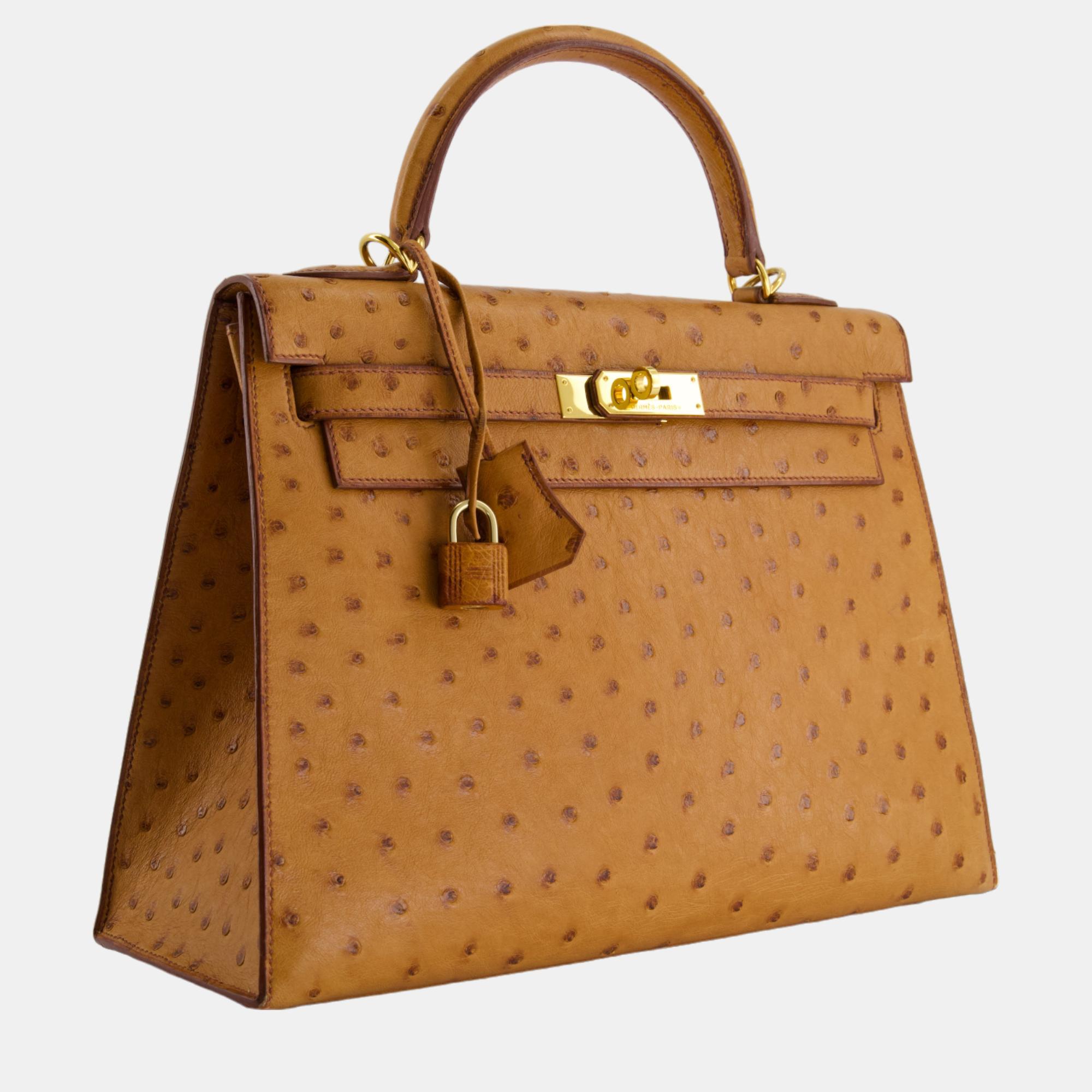 

Hermes Kelly  in Cognac Ostrich Leather with Gold Hardware, Brown