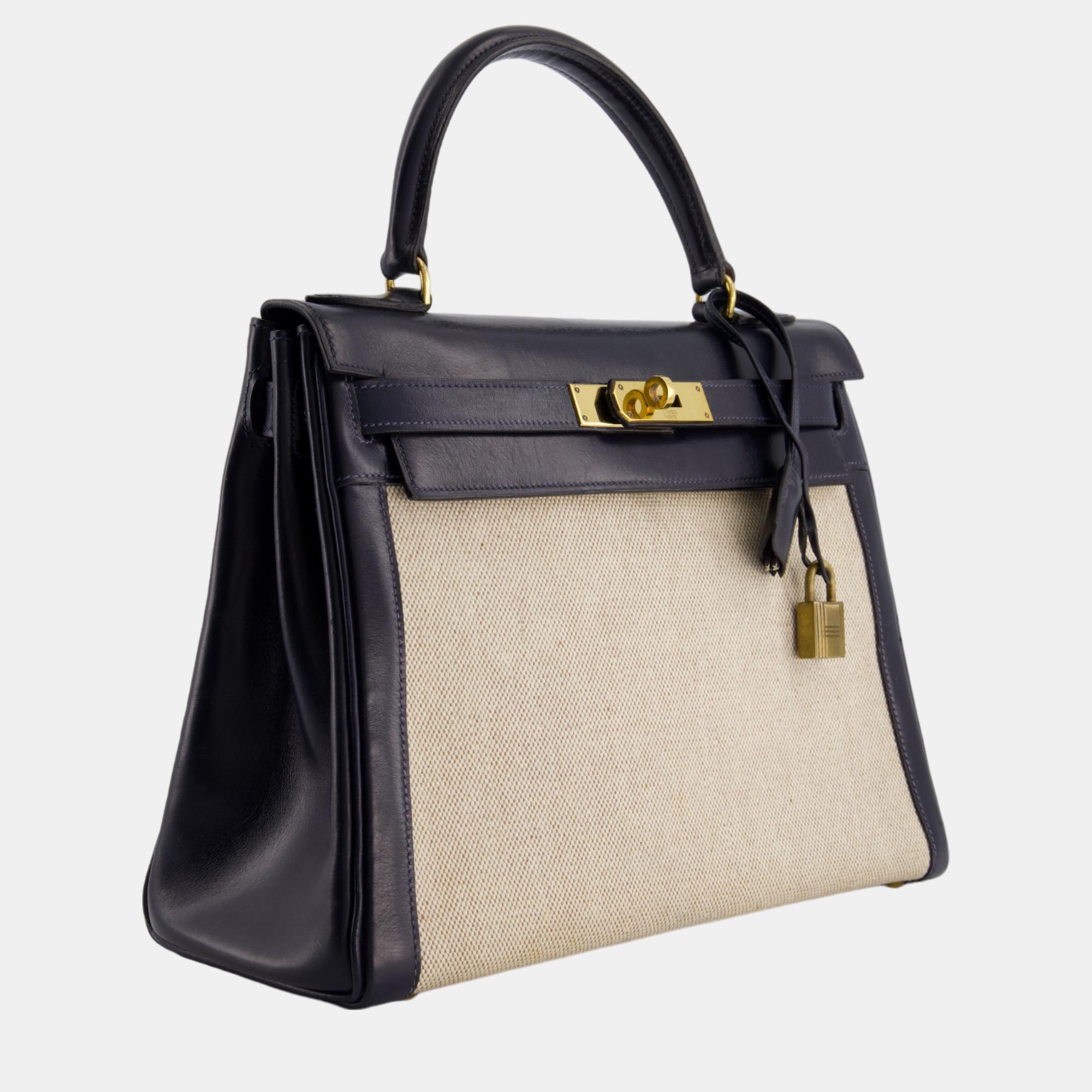 

Hermes Vintage Kelly  Bag in Ecru Canvas and Navy Box Leather with Gold Hardware, Beige