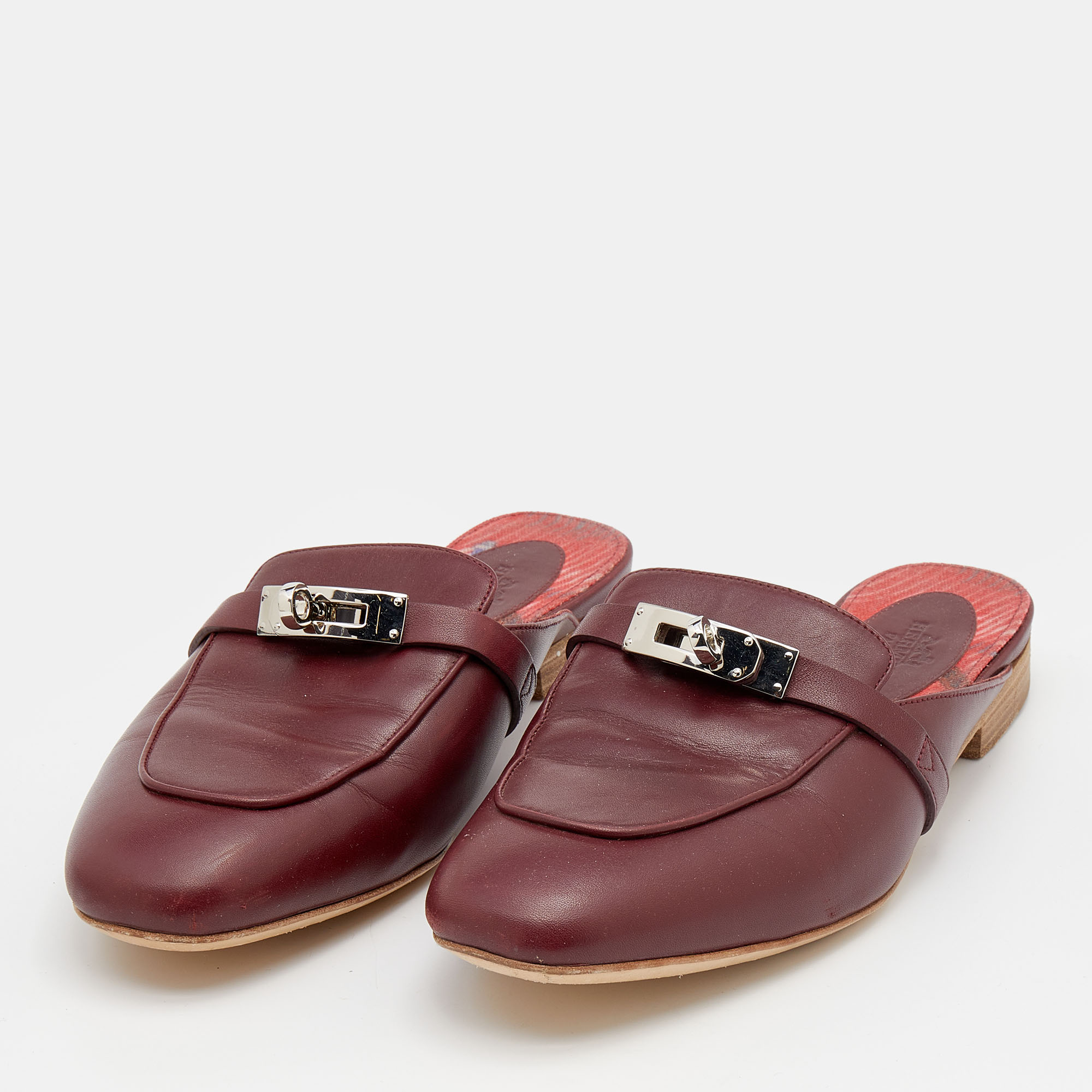 

Hermes Burgundy Leather Palladium Plated Oz Mules Size