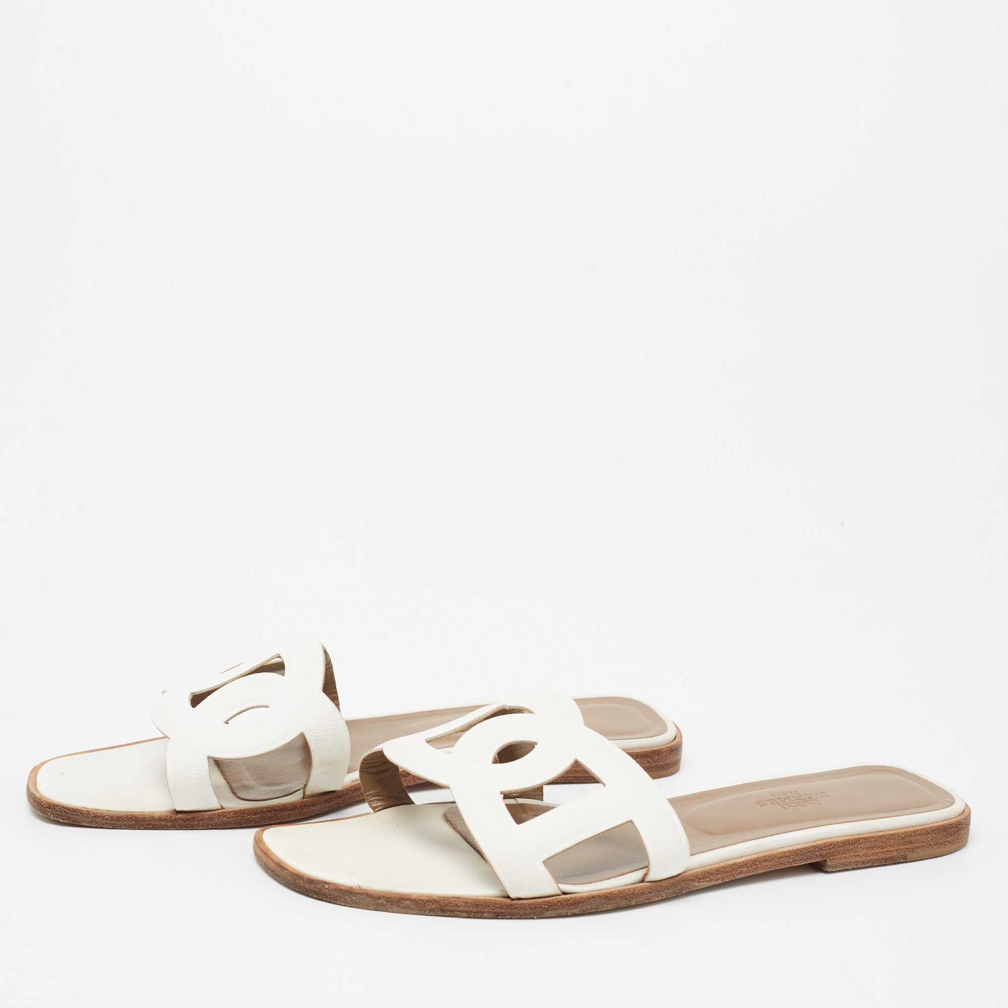 

Hermes White Leather Omaha Flat Slides Size