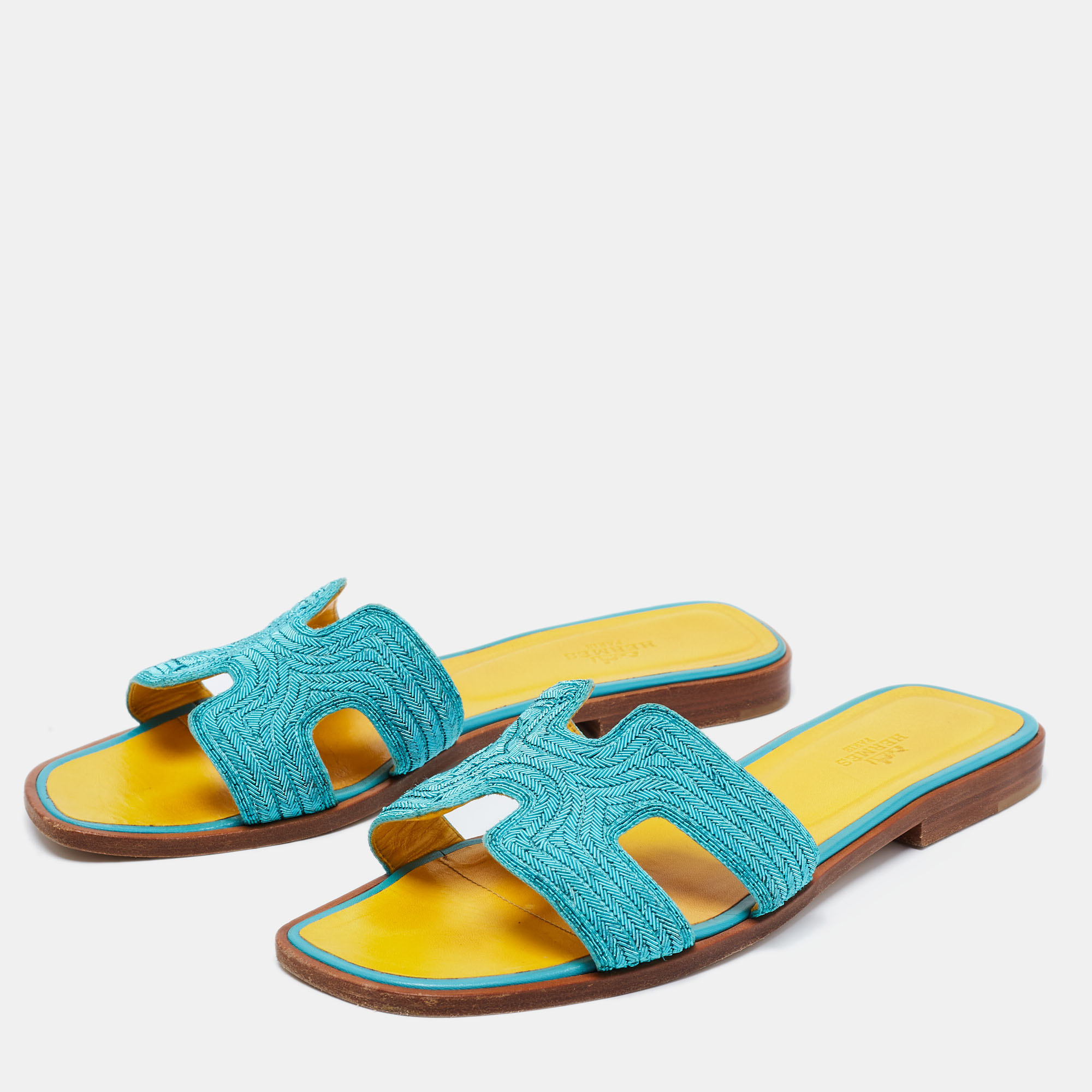 

Hermes Blue Embellished Leather Oran Flat Slides Size