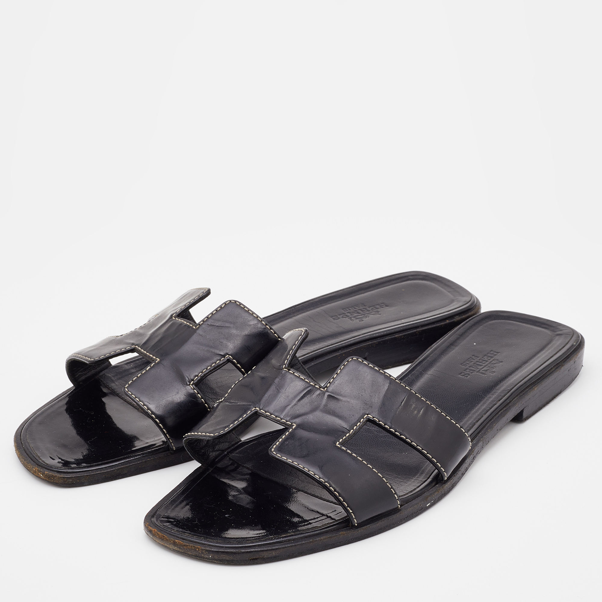 

Hermes Black Leather Oran Flat Slides Size
