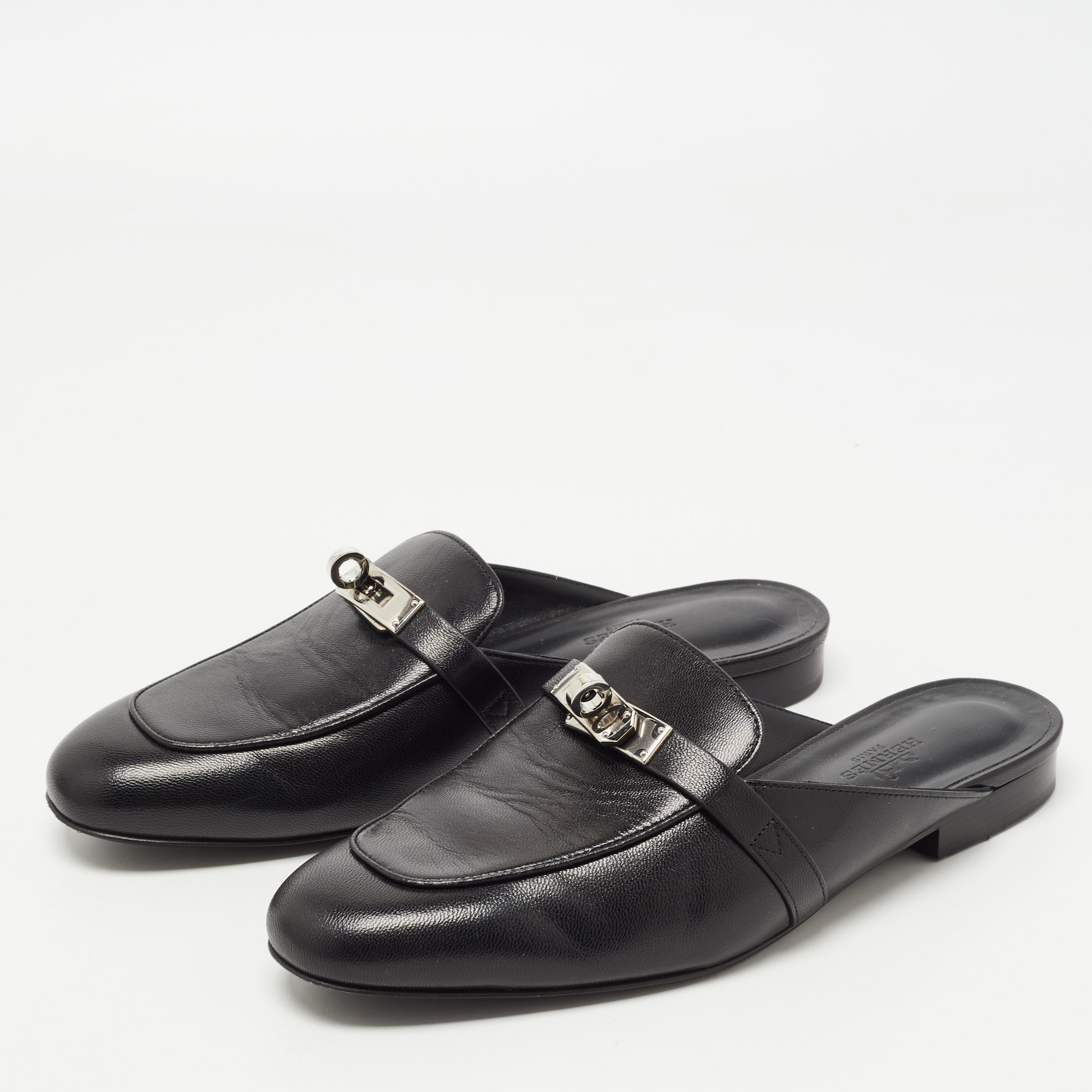 

Hermes Black Leather Palladium Plated Oz Mules Size