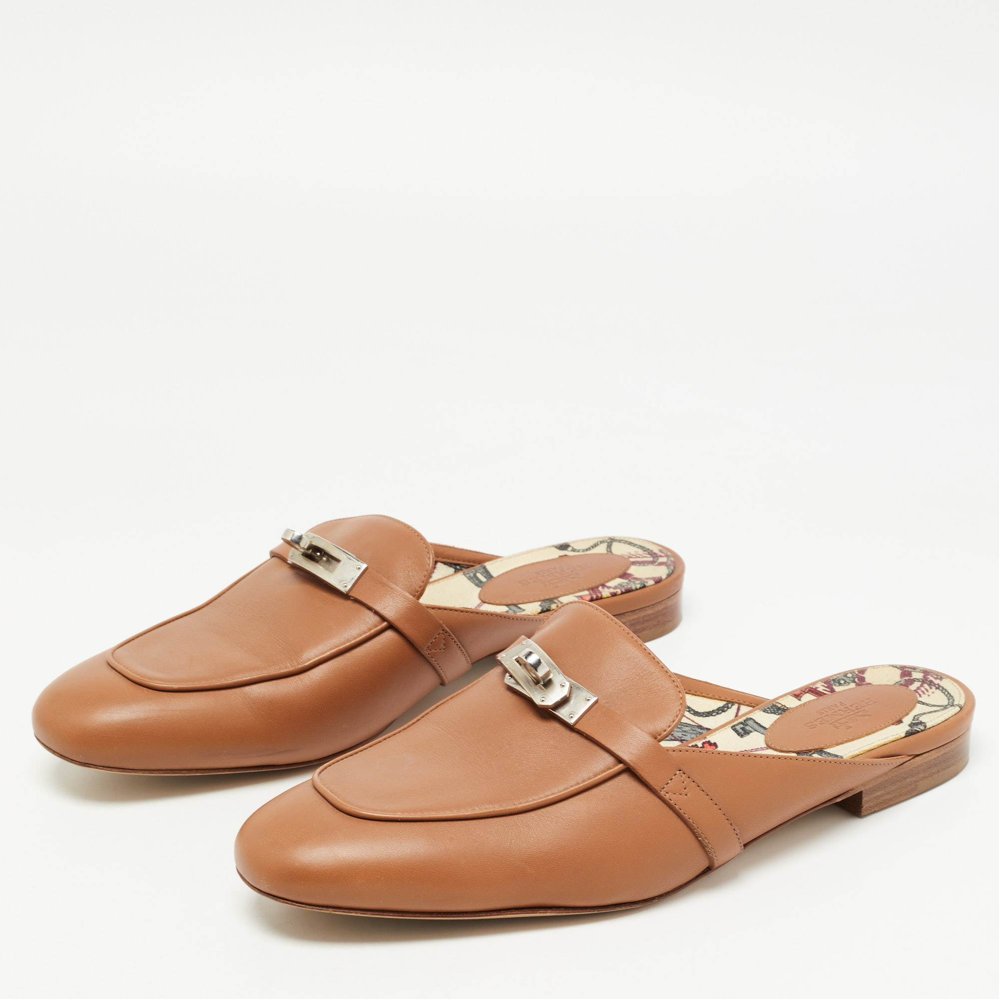 

Hermes Brown Leather Oz Mules Size