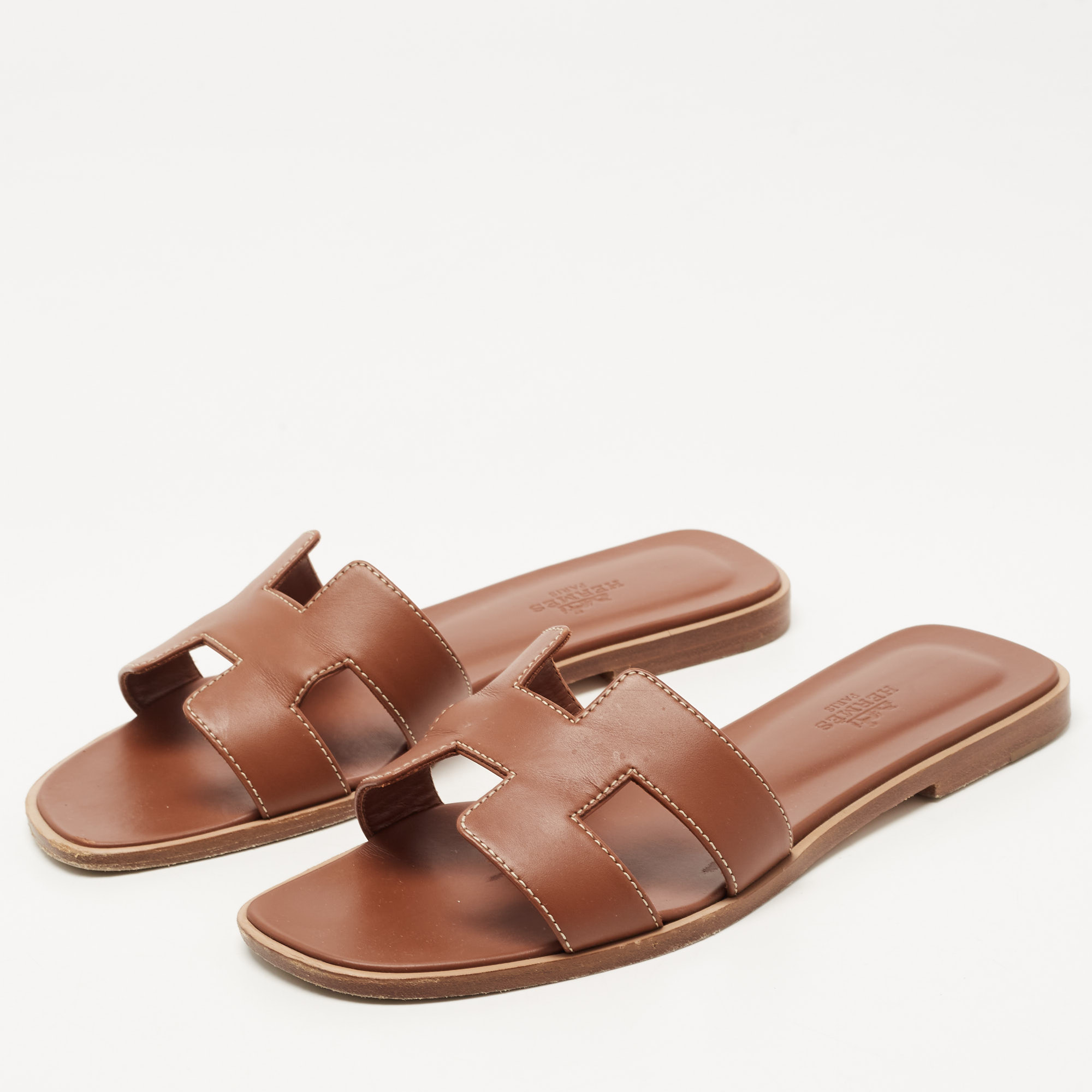 

Hermes Brown Leather Oran Flat Slides Size