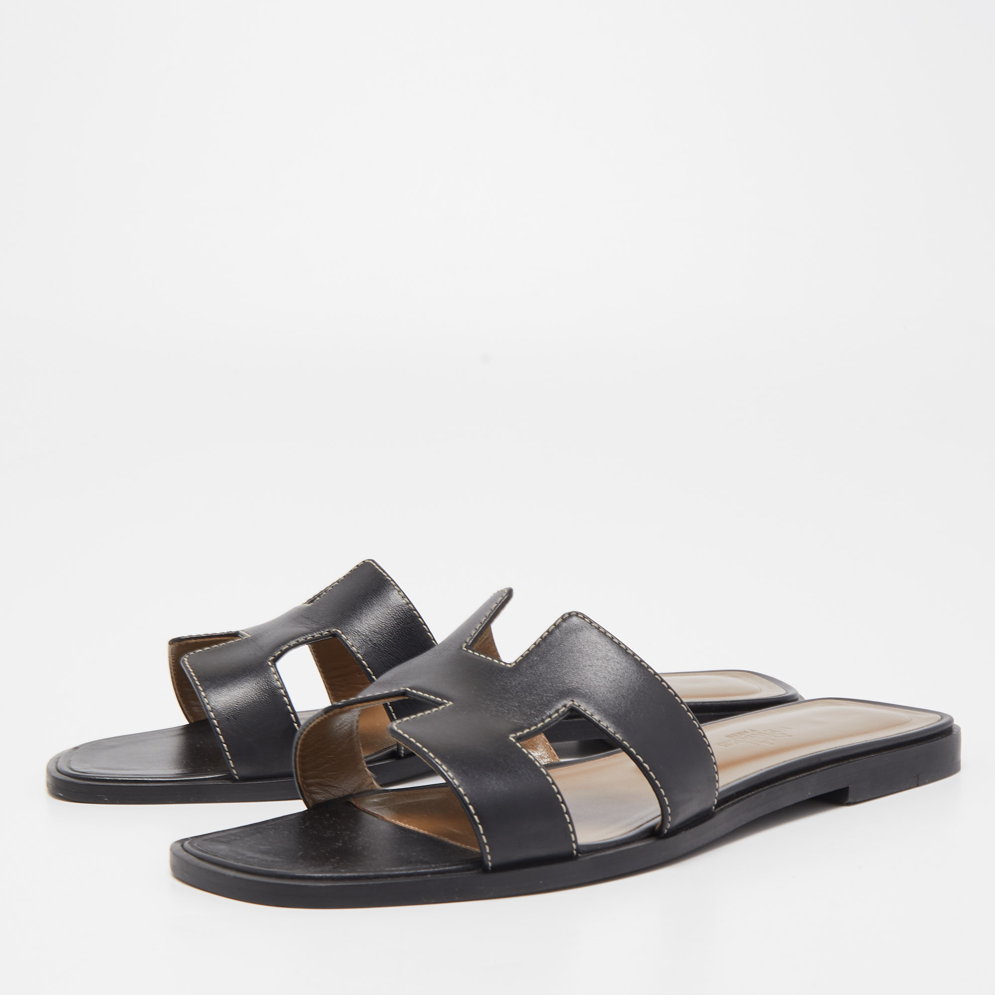 

Hermes Black Leather Oran Flat Slides Size