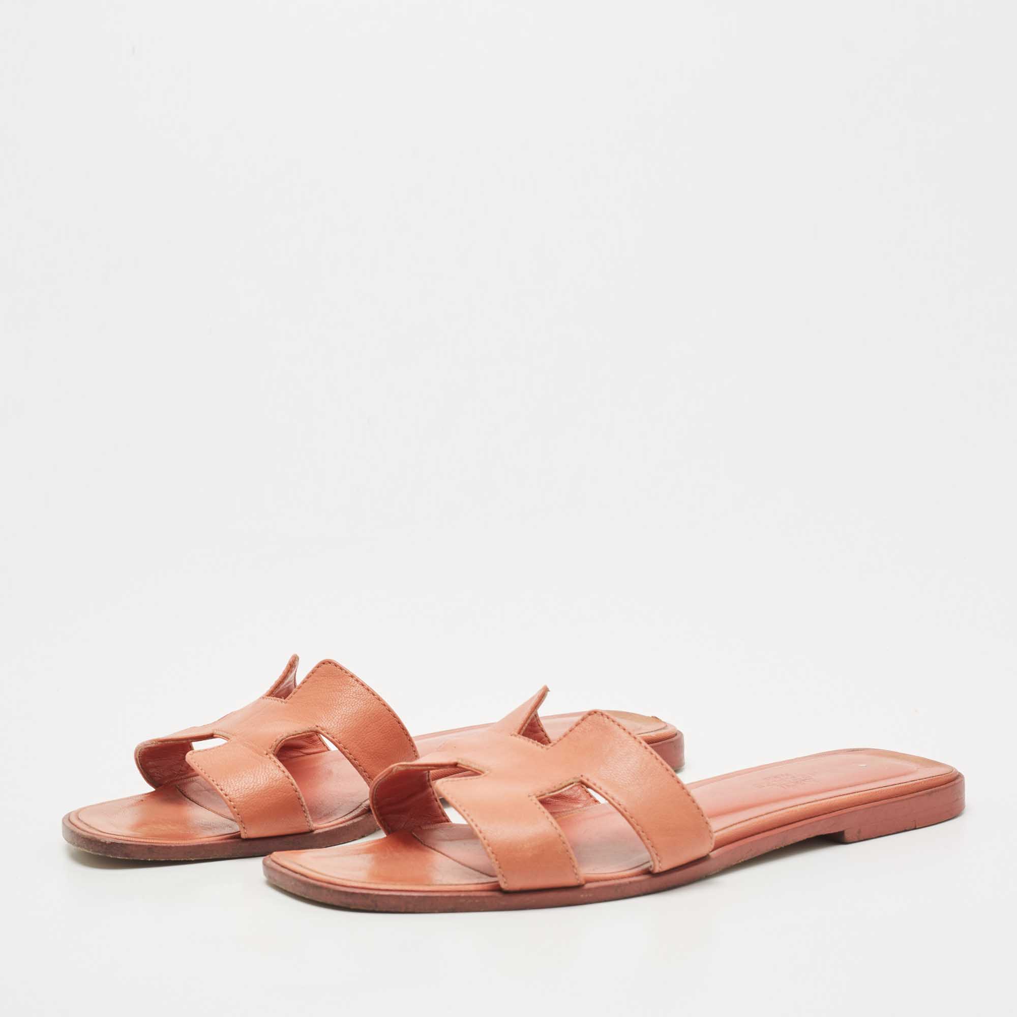 

Hermes Orange Leather Oran Flat Slides Size
