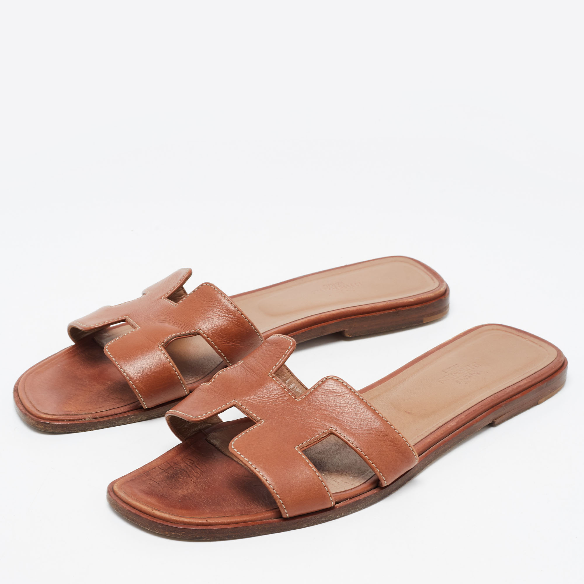 

Hermes Brown Leather Oran Flat Slides Size