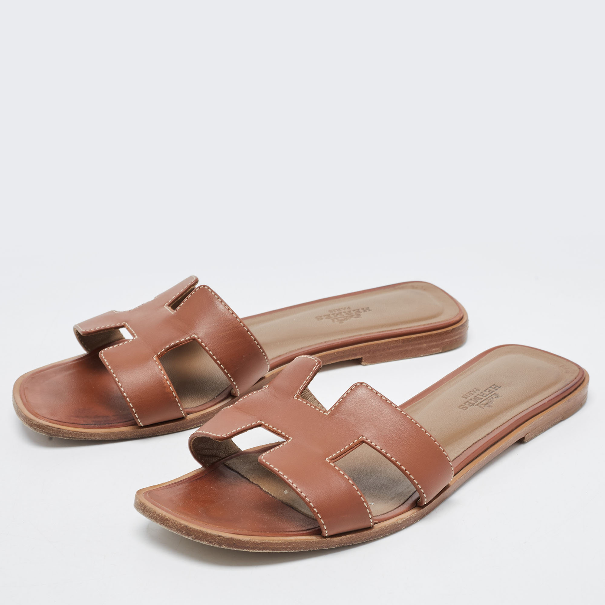 

Hermes Brown Leather Oran Flat Slides Size