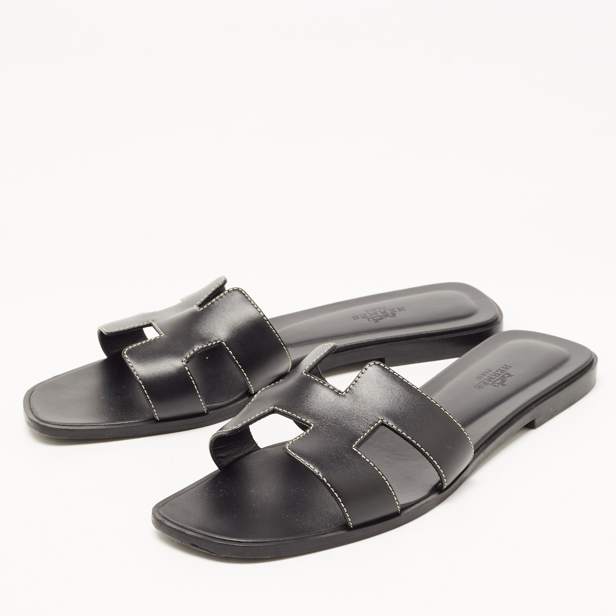 

Hermes Black Leather Oran Flat Slides Size