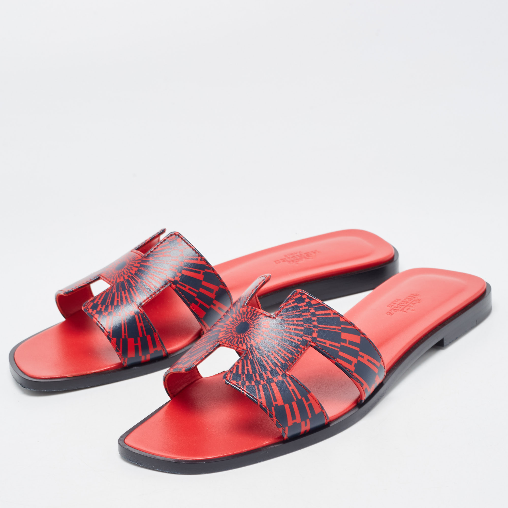 

Hermes Red/Blue Print Leather Oran Flat Slides Size