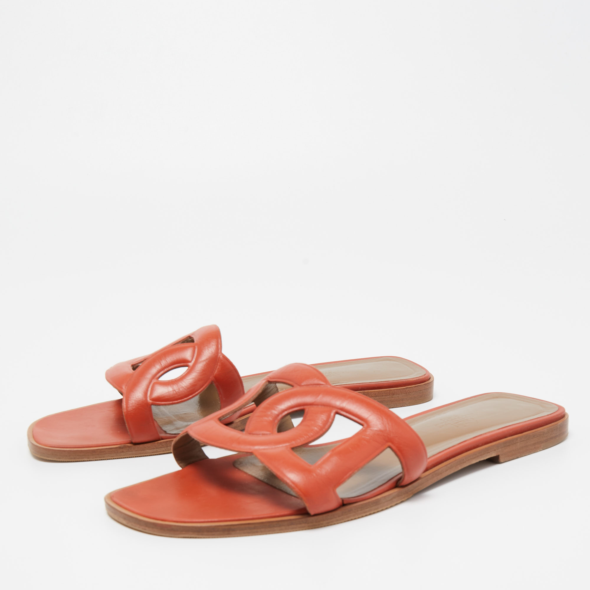 

Hermes Orange Leather Omaha Flat Slides Size