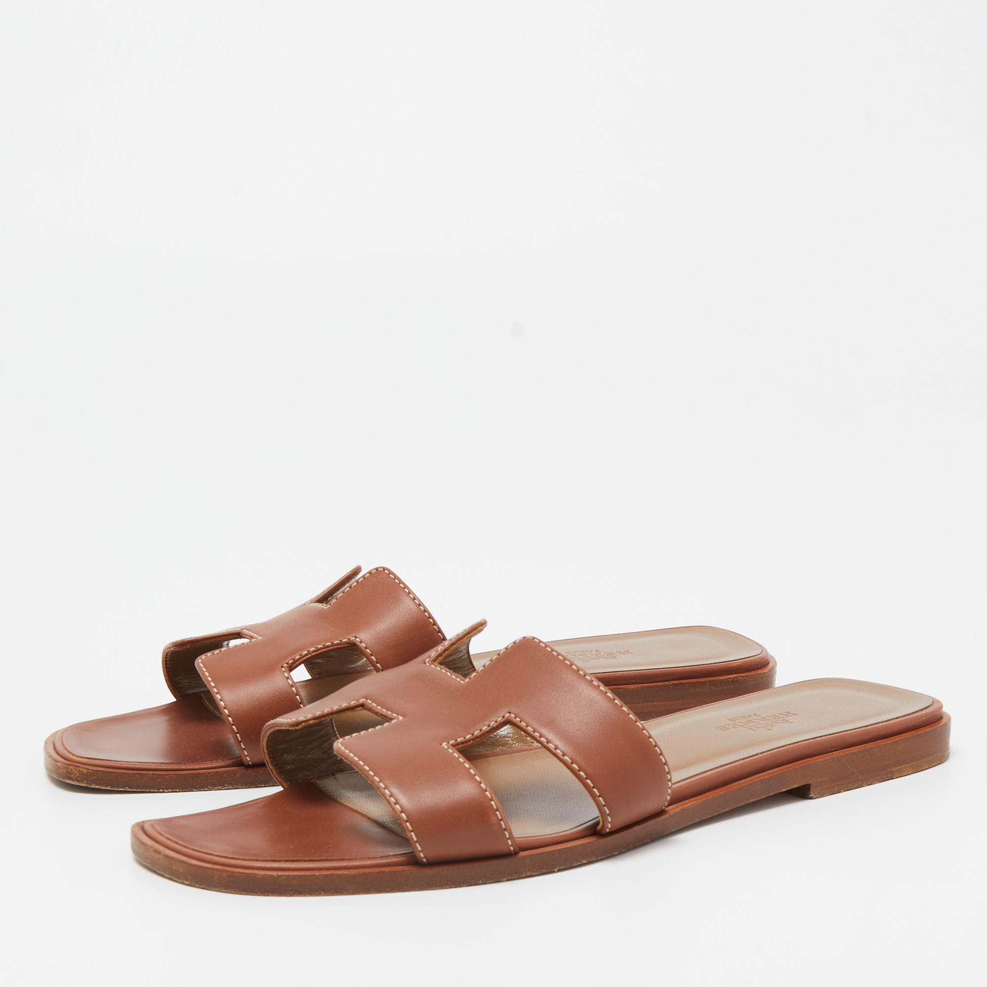 

Hermes Brown Leather Oran Flat Slides Size